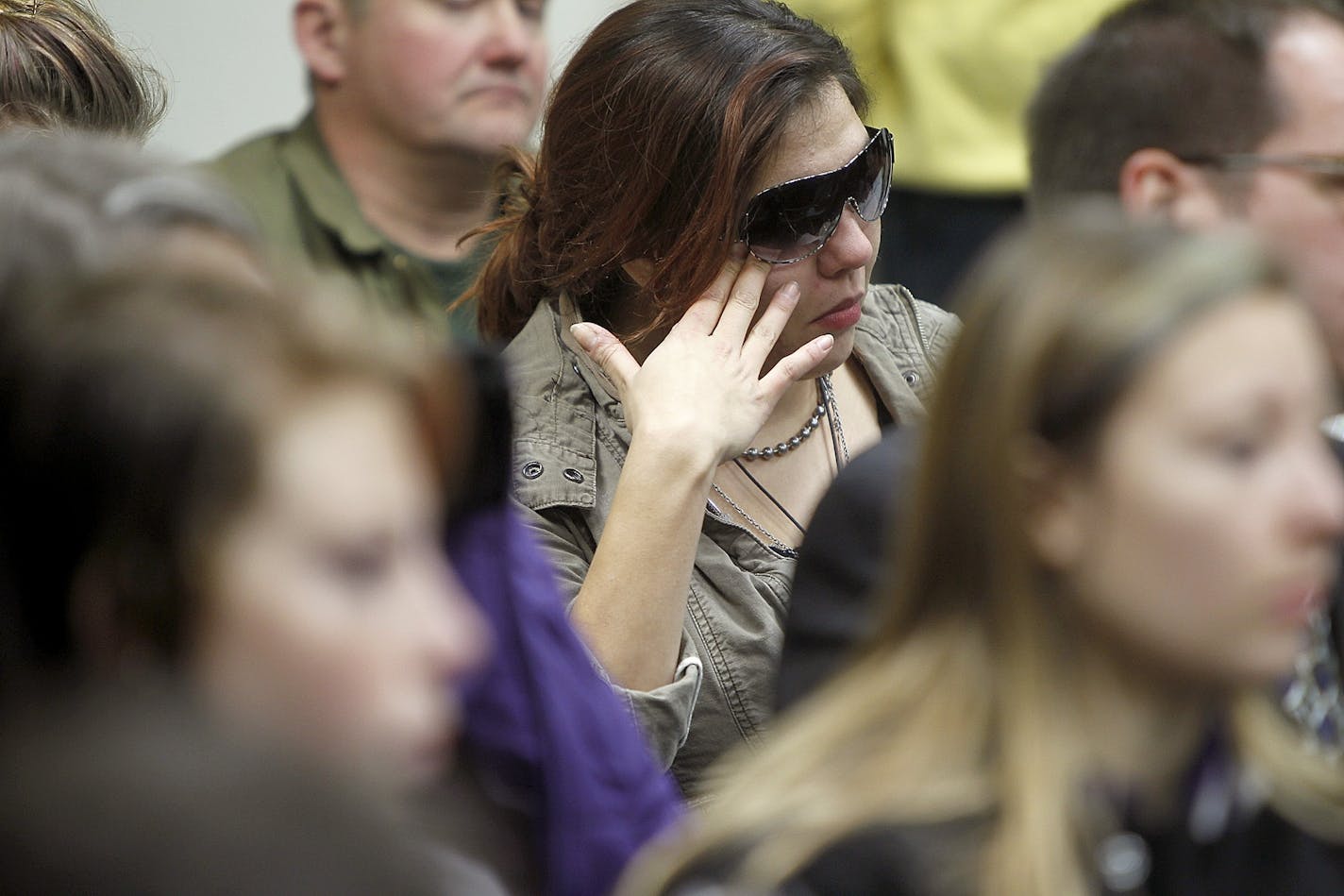 Family members and friends of the victims listened as Morrison County Sheriff Michel Wetzel described the crime Monday after Byron David Smith was charged.