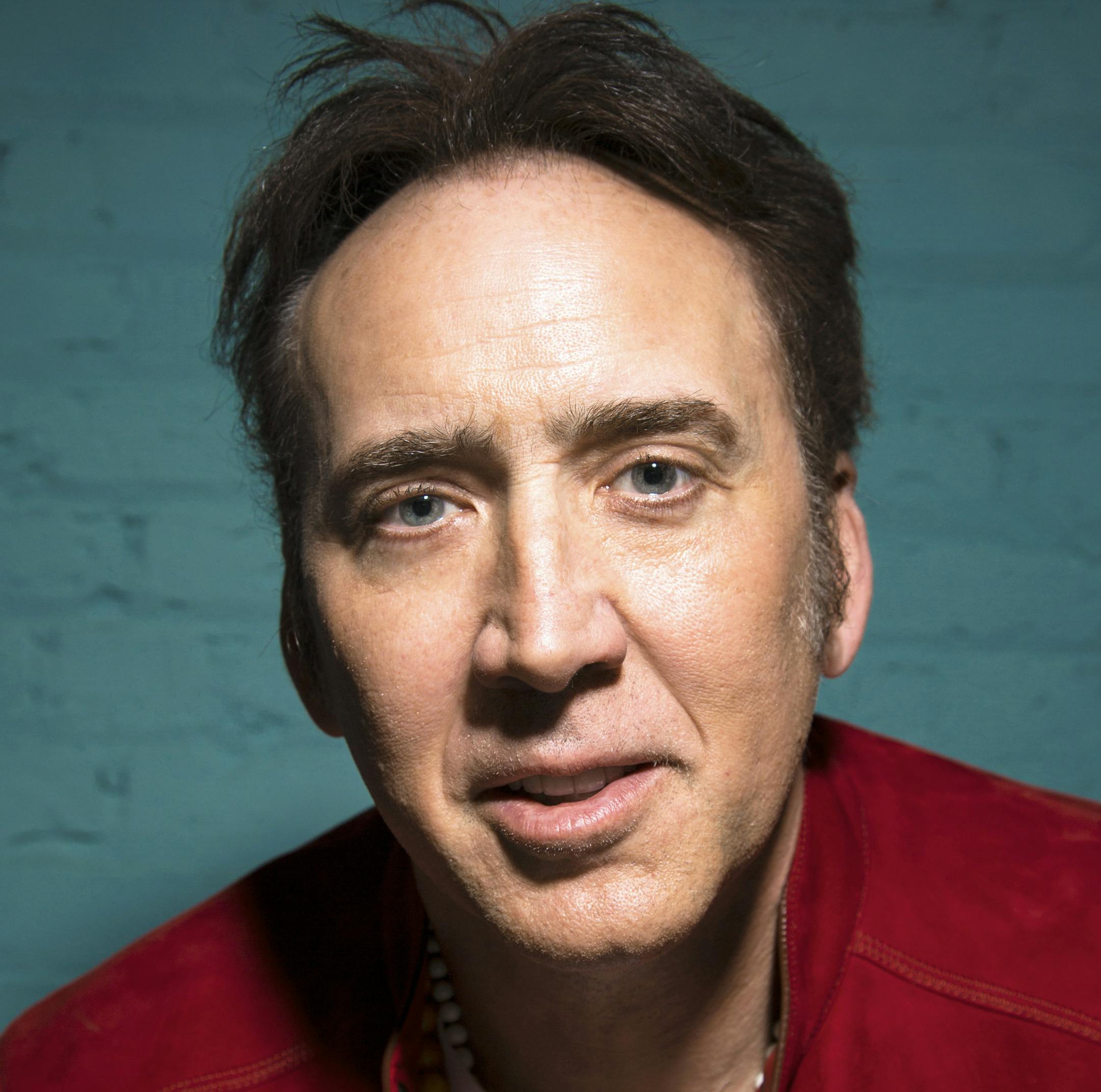 FILE -- Nicholas Cage, who purchased the skull of a Tyrannosaurus bataar at an auction for $276,000 in 2007, in Los Angeles, March 22, 2014. Authorities say the skull was stolen from the Gobi Desert in Mongolia, and the Department of Homeland Security contacted Cage in 2014, and he has agreed to turn it over. (Michael Lewis/The New York Times)