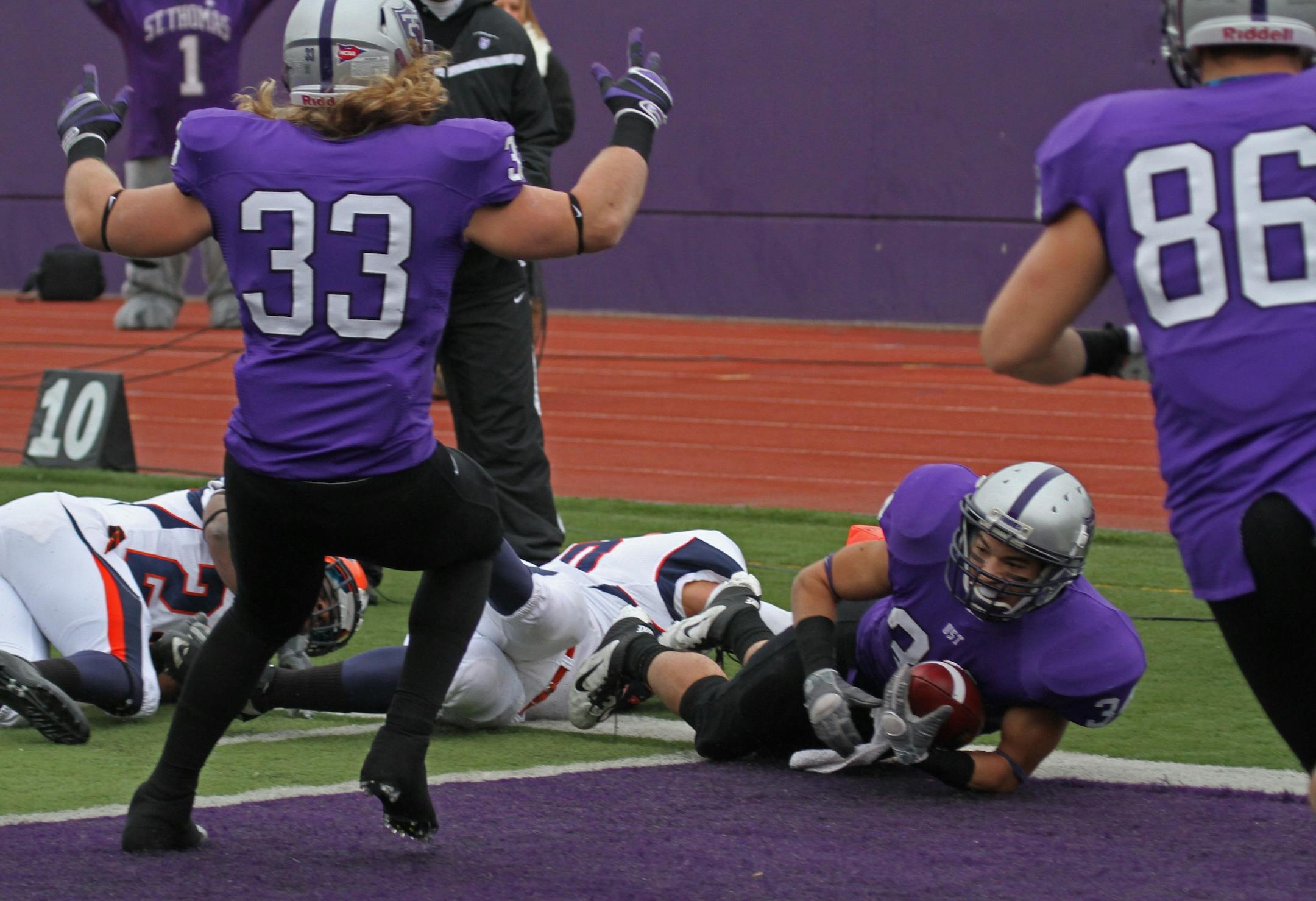 St. Thomas running back Brenton Braddock ran into the endzone for the first Tommies touchdown.