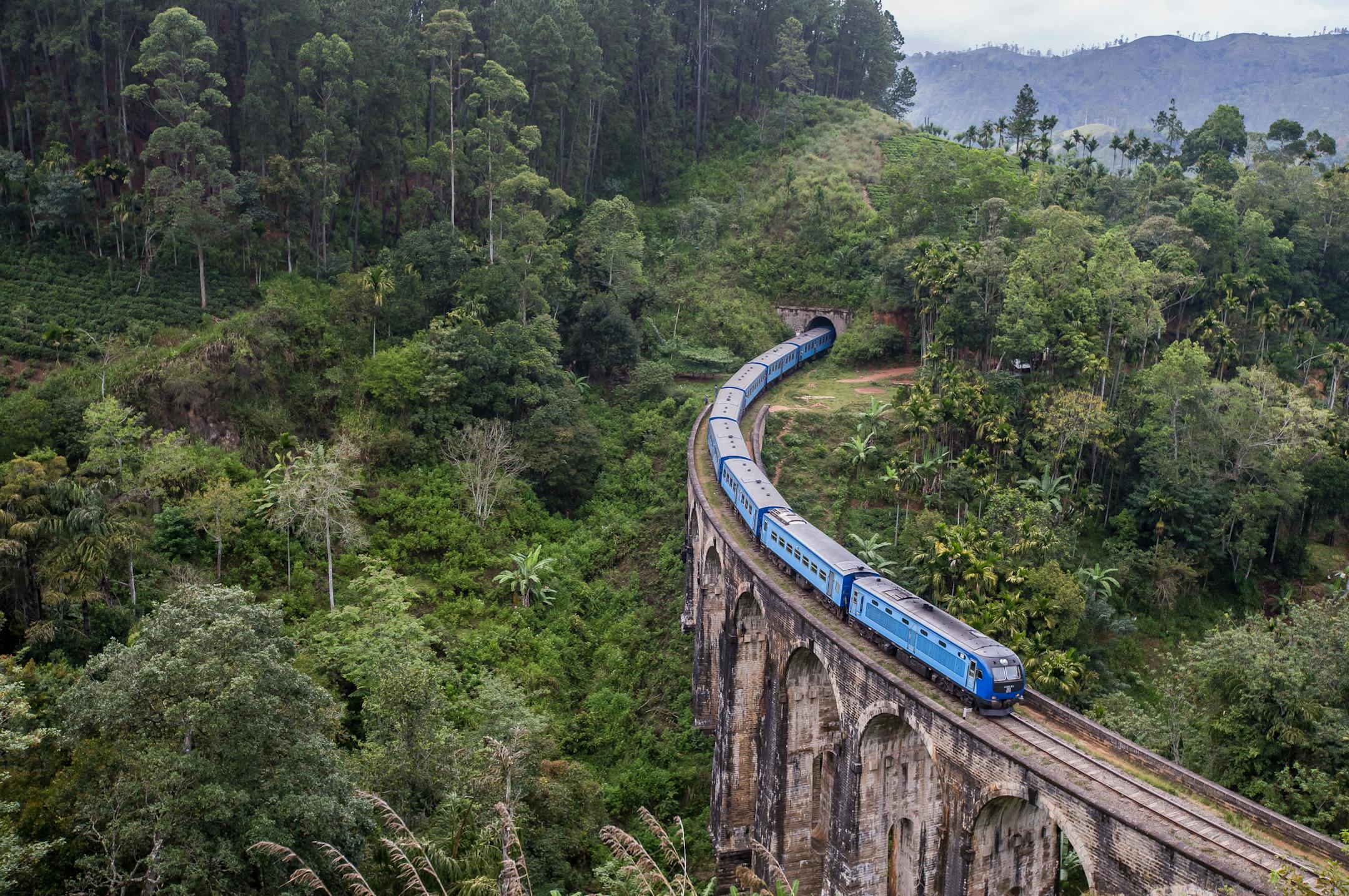 A train crosses the Nine Arches Bridge, near Ella, Sri Lanka. Navigating Sri Lanka's hill country by rail can be a beguiling experience but also a time-consuming one.