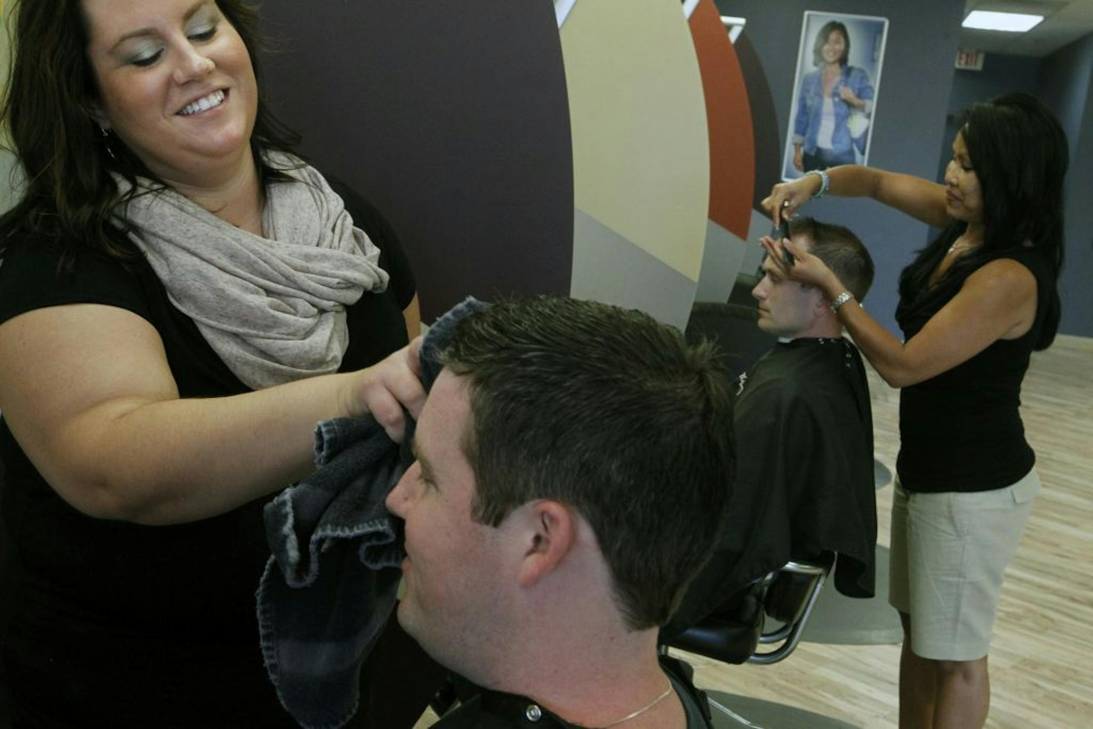 At the Southtown Great Clips in Bloomington, hairdresser Lucy Boston gave up the insurance offered by owner Nancy Peyton because of the high cost.