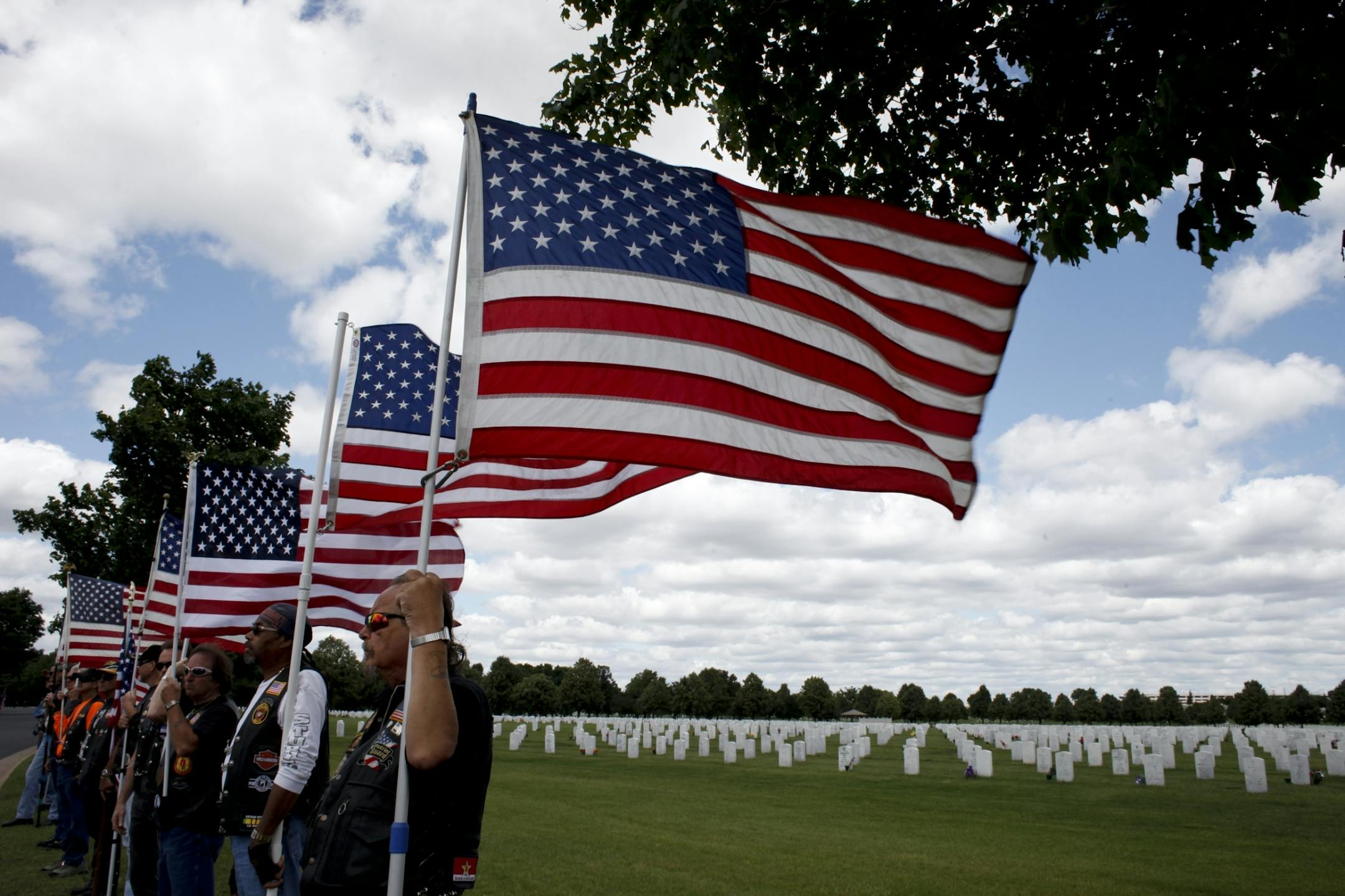 members of the Minnesota Patriot Guard lined the entrance to Fort Snelling National Cemetery on Monday before a memorial service for Navy Lt. William E. Swanson of Brooklyn Center, whose plane was shot down during the Vietnam War.