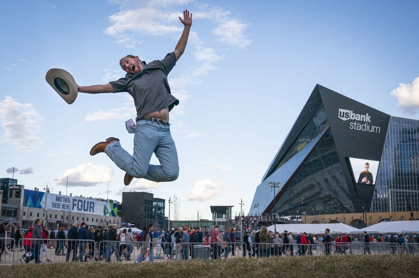 Texas Tech alum Clay Smith posed for a photo outside of U.S. Bank Stadium before the NCAA title game Monday night at U.S. Bank Stadium.