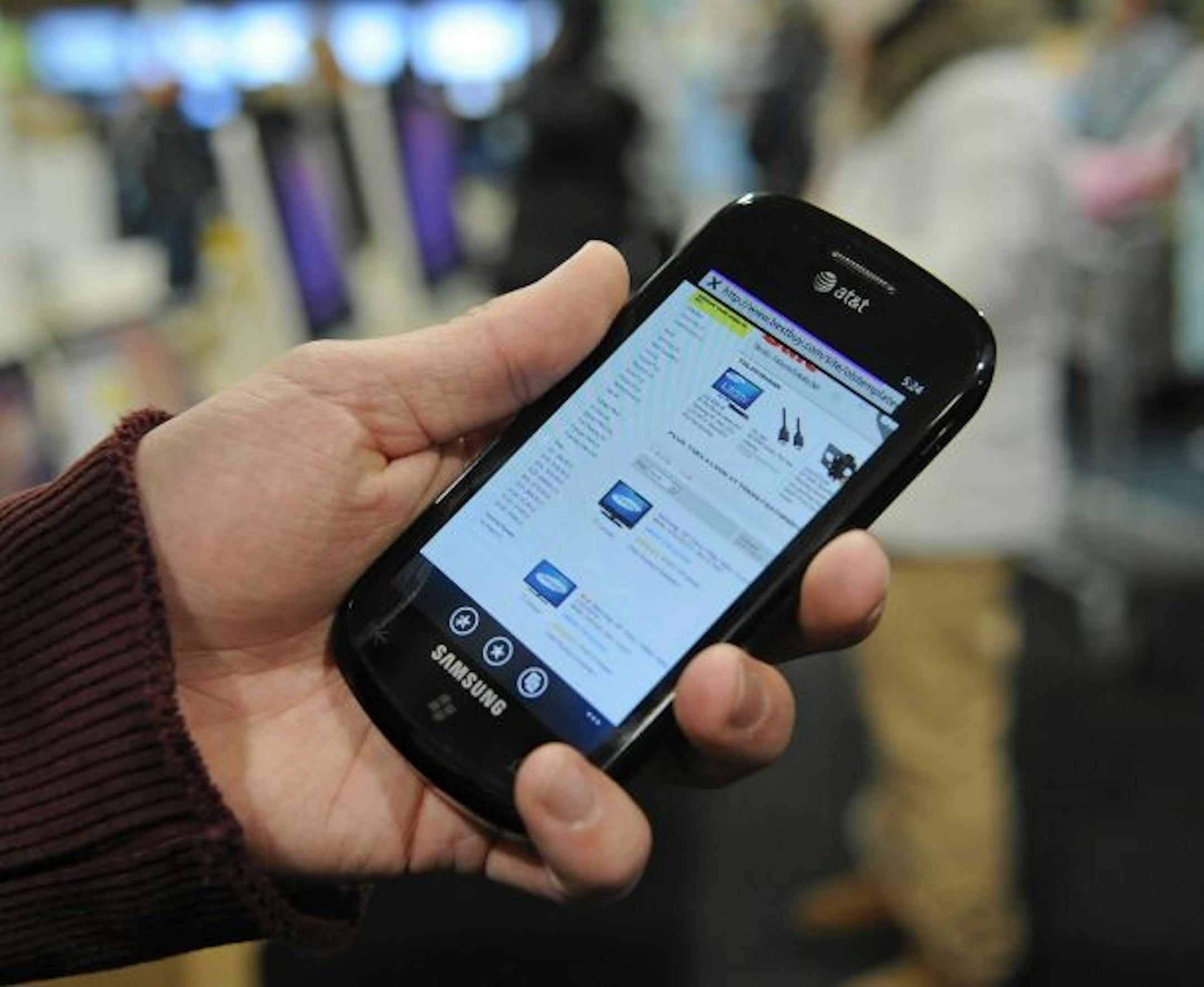 Jay Ebert, 17, of Columbia Heights used his smart phone to shop for a camera.