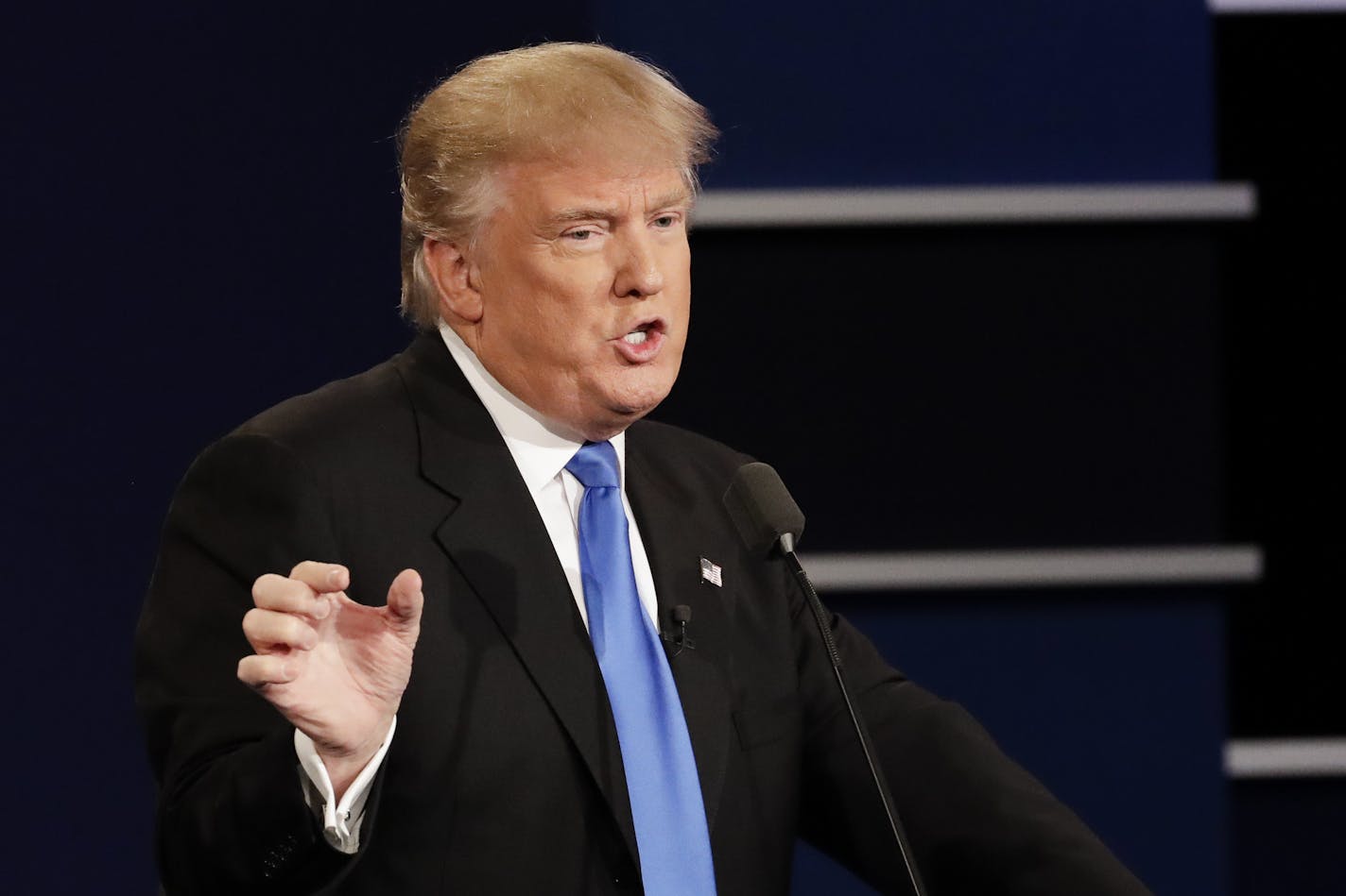 Republican presidential nominee Donald Trump answers a question during the presidential debate with Democratic presidential nominee Hillary Clinton at Hofstra University in Hempstead, N.Y., Monday, Sept. 26, 2016. (AP Photo/David Goldman)