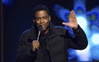 FILE - In this Feb. 28, 2015 file photo, comedian Chris Rock performs at Comedy Central's "Night of Too Many Stars: America Comes Together for Autism 