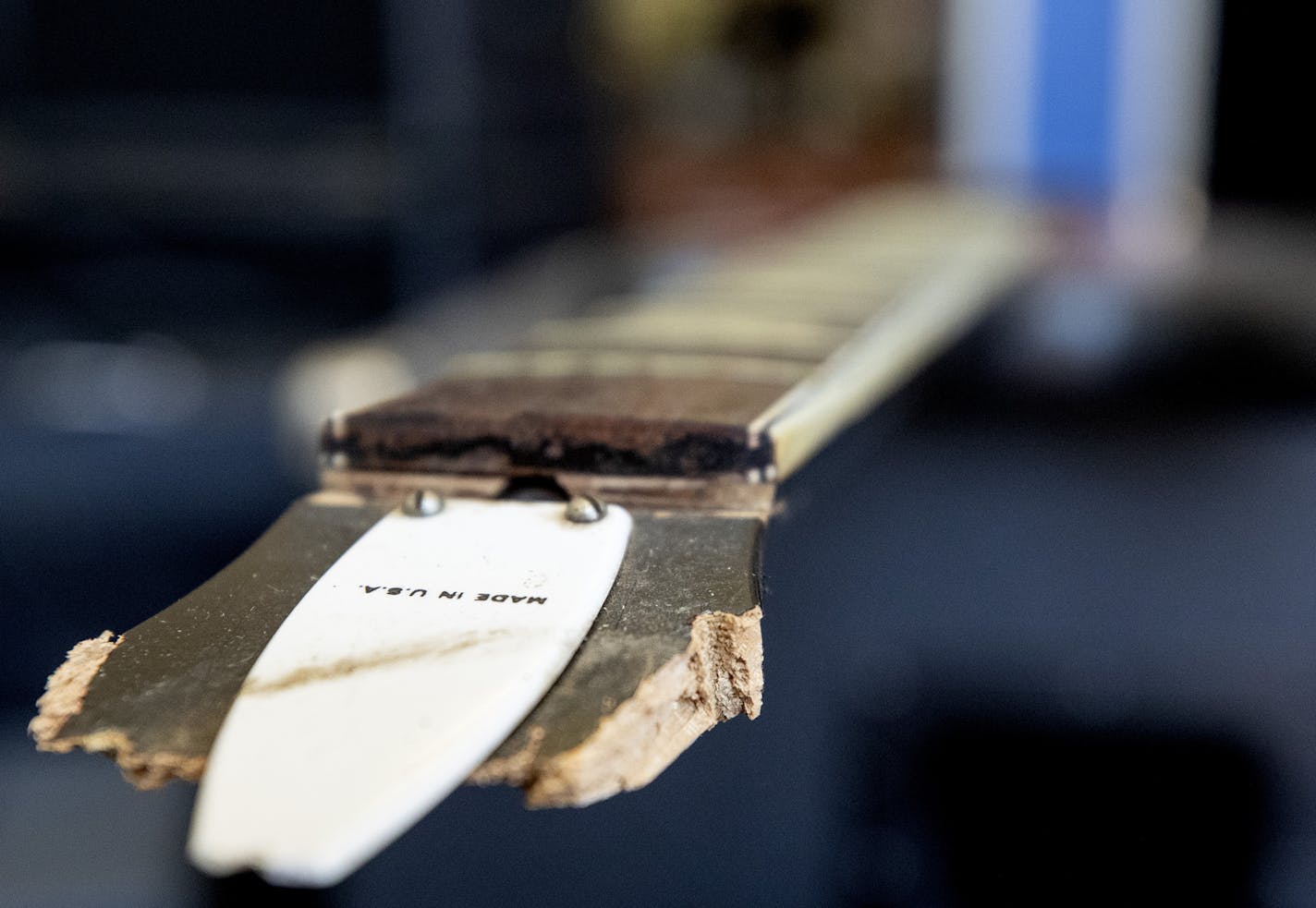 A damaged guitar at Vig's guitars in St. Paul. The store is working on reopening after being looted. ] CARLOS GONZALEZ • cgonzalez@startribune.com – St. Paul, MN – June 25, 2020, Angie and Ted Vig breathed a sigh of relief when they got the email saying they'd been selected to receive a $7,500 grant from the St. Paul Bridge Fund, a city cash assistance program designed to help businesses survive COVID-19-related closures. They used the money to cover overhead for a couple months, as they eyed pa