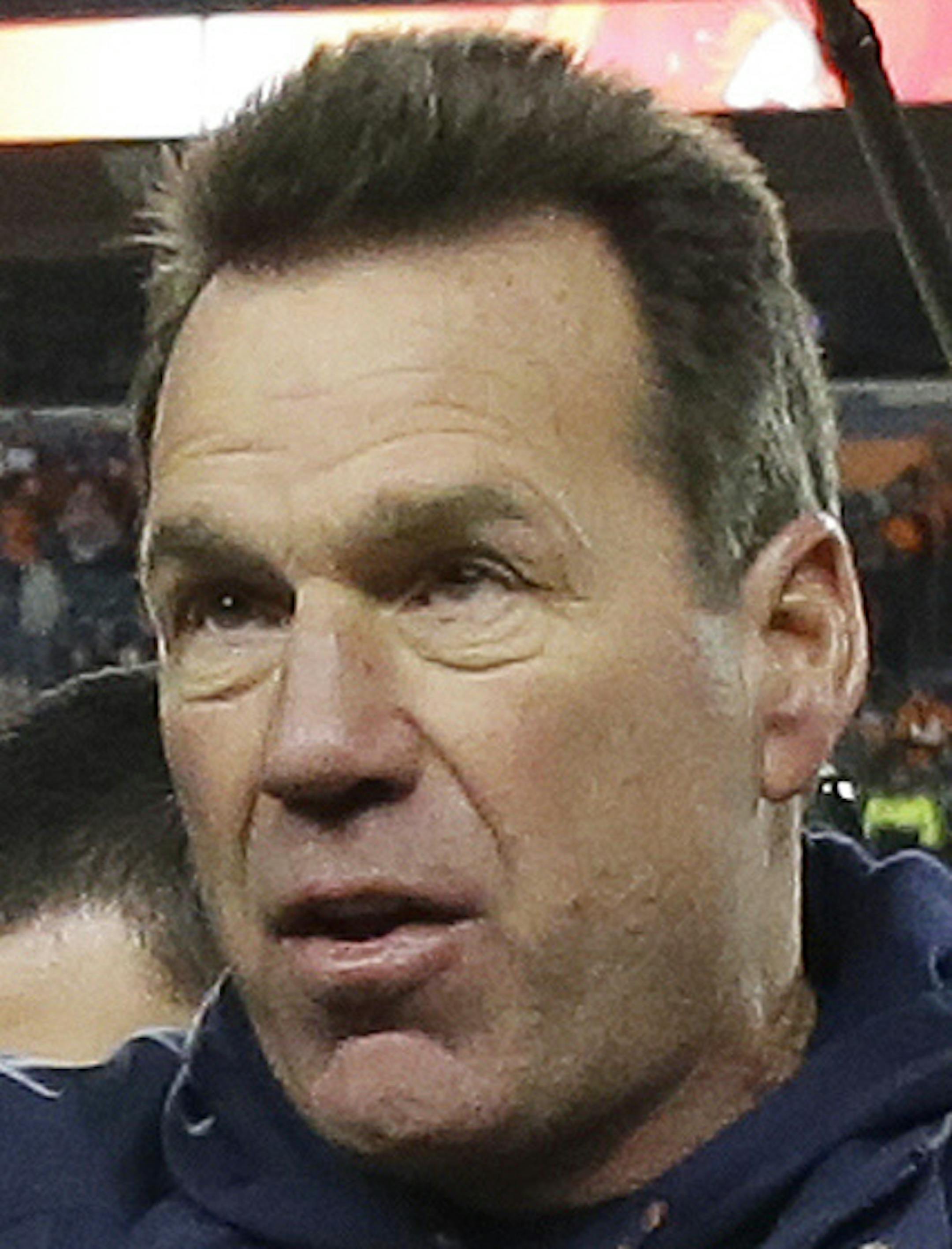 Denver Broncos coach Gary Kubiak waves as he walks off the field after the team's NFL football game against the Oakland Raiders, Sunday, Jan. 1, 2017, in Denver. The Broncos won 24-6. (AP Photo/Jack Dempsey)