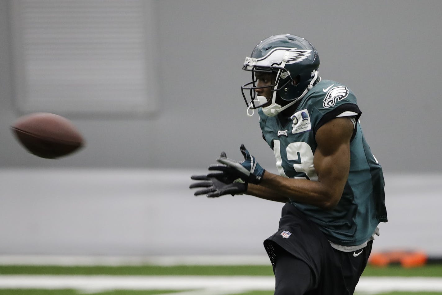 Philadelphia Eagles' Nelson Agholor catches a pass during practice at the team's NFL football training facility in Philadelphia, Thursday, Jan. 25, 2018. The Eagles face the New England Patriots in Super Bowl 52 on Sunday, Feb. 4, in Minneapolis. (AP Photo/Matt Rourke)