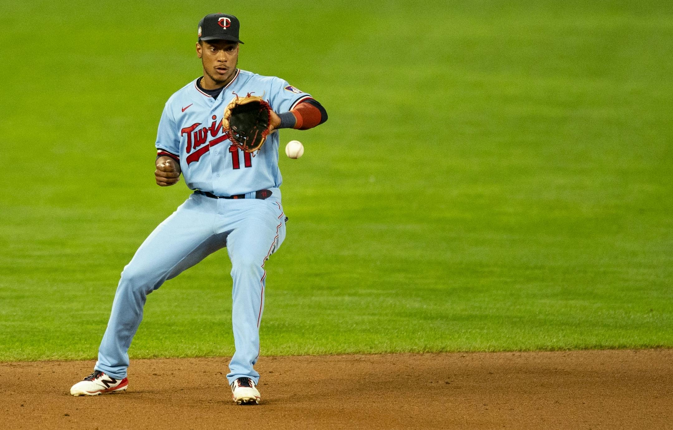 Minnesota Twins shortstop Jorge Polanco (11) caught a ball off the hop during Wednesday night's game.
