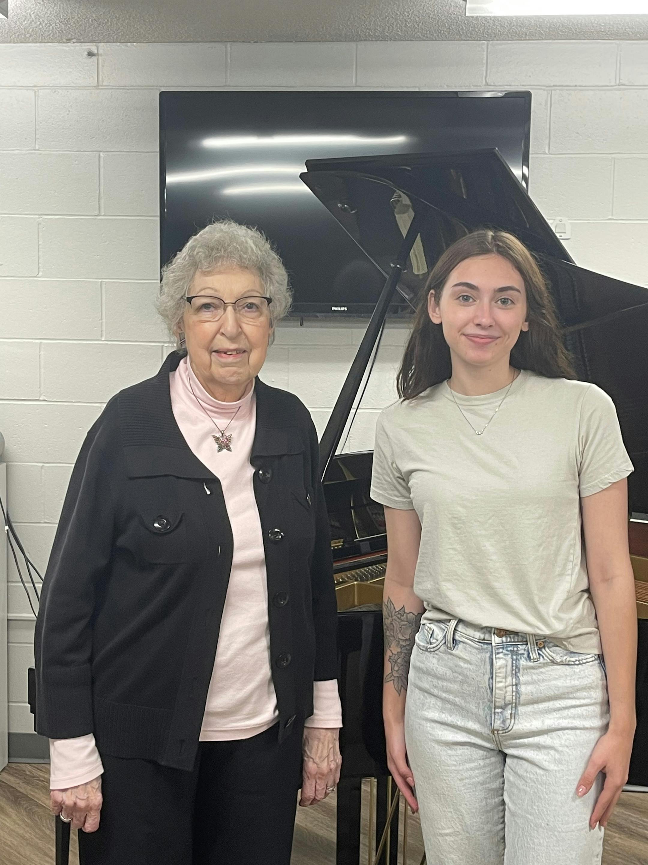 Arlene DeVries, left, and Molly McDonough have become good friends at the Wesley Acres senior living community in Des Moines. MUST CREDIT: Fred DeVries