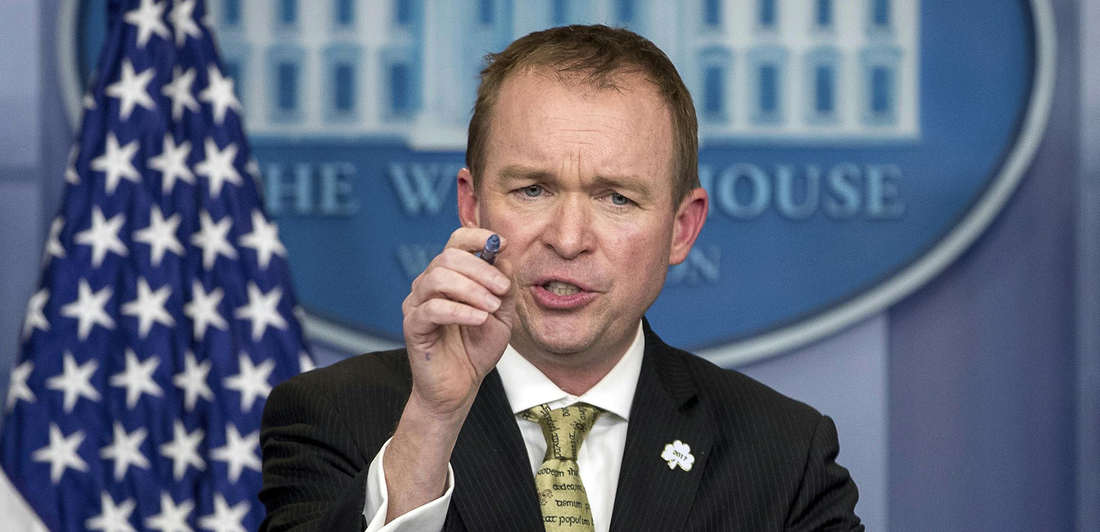 FILE - In this March 16, 2017, file photo, White House budget director Mick Mulvaney speaks at the White House, in Washington. Mulvaney says that Democratic negotiators on a massive spending bill need to agree to funding top priorities of President Donald Trump, such as a down payment on a border wall and hiring of additional immigration agents. Mulvaney told The Associated Press on April 20, that ìelections have consequencesî and that ìwe want wall fundingî as part of the ca