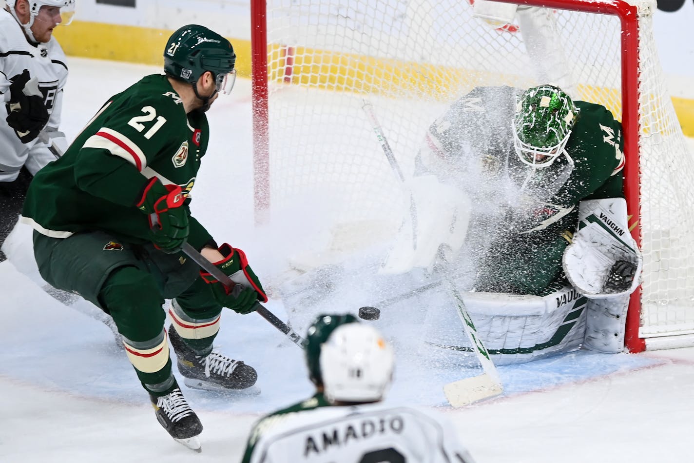 Minnesota Wild defenseman Carson Soucy (21) and goaltender Kaapo Kahkonen (34) defended against a Los Angeles Kings shot at Kahkonen took a face-full of ice. ] AARON LAVINSKY • aaron.lavinsky@startribune.com