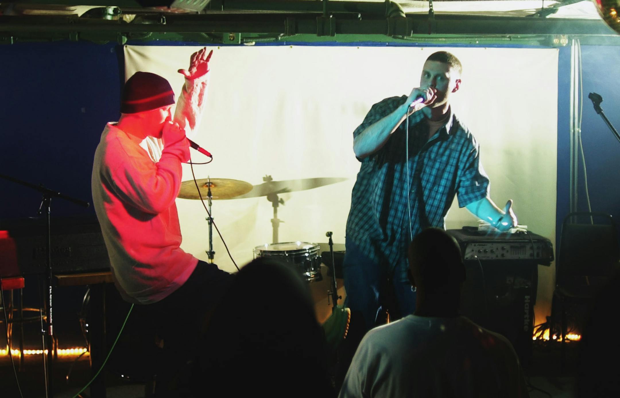 SUNDAY_01/27/02_Minneapolis - - - - - - Mike Madison (left) and Jesse Semanko (right), part of the local hip-hop trio group, Unknown Prophets, performs at the Dinkytowner Cafe in Dinkytown.