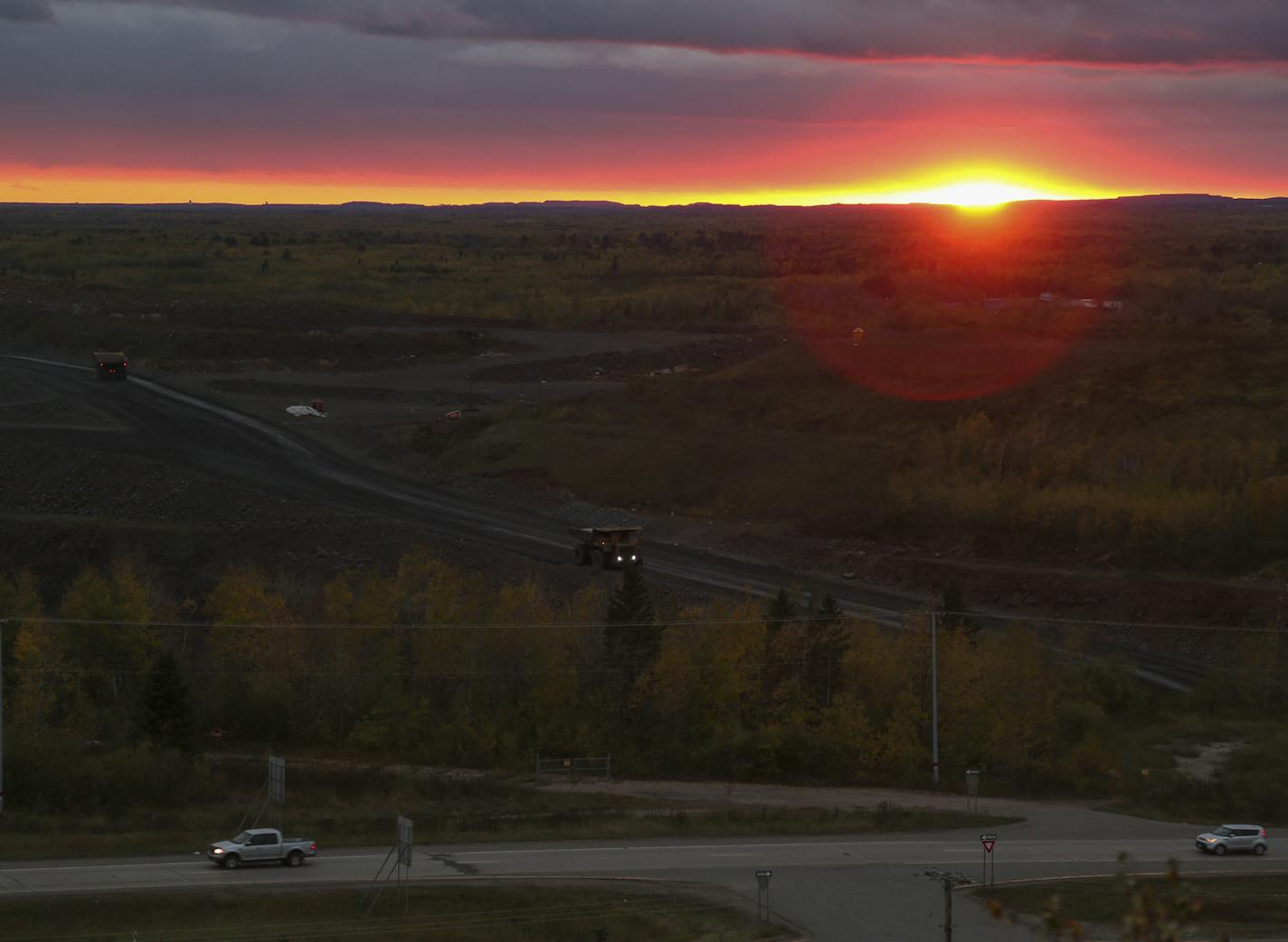 The mining operation at the Auburn Pit, rear, is slated to devour Highway 53 in the foreground by spring of 2017. This view is from the Mineview in the Sky overlook Tuesday afternoon in Virginia. ] JEFF WHEELER &#x2022; jeff.wheeler@startribune.com A four-lane stretch of highway through the Iron Range is about to vanish into an open pit mine and the state only has a few years left to figure out where, and how, to build a new route for Highway 53. Eveleth would have been isolated if the cheapest