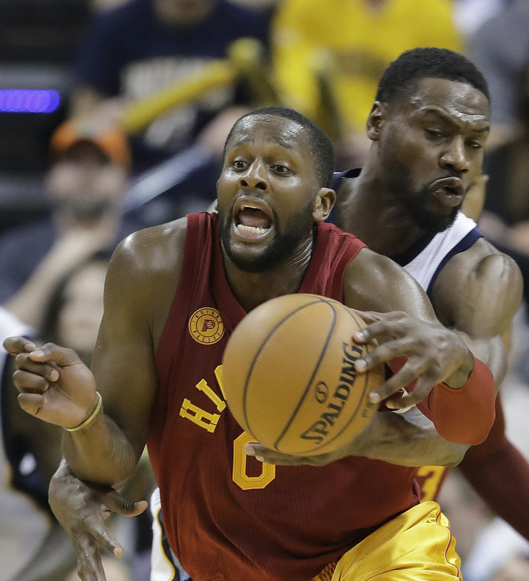 Indiana Pacers' C.J. Miles is defended by Memphis Grizzlies' Tony Allen during the second half of an NBA basketball game Friday, Feb. 24, 2017, in Indianapolis. Indiana defeated Memphis 102-92. (AP Photo/Darron Cummings)
