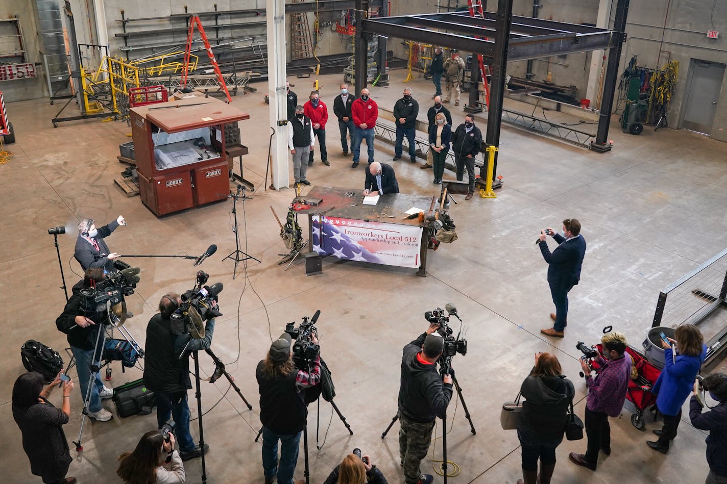 Governor Tim Walz was joined by union leaders at the Ironworkers Local 512 Training Center in St. Paul as he signed the $1.9 billion bonding bill. ] GLEN STUBBE • glen.stubbe@startribune.com Wednesday, October 21, 2020 Governor Tim Walz was joined by union leaders at the Ironworkers Local 512 Training Center in St. Paul as he signed the $1.9 billion bonding bill.