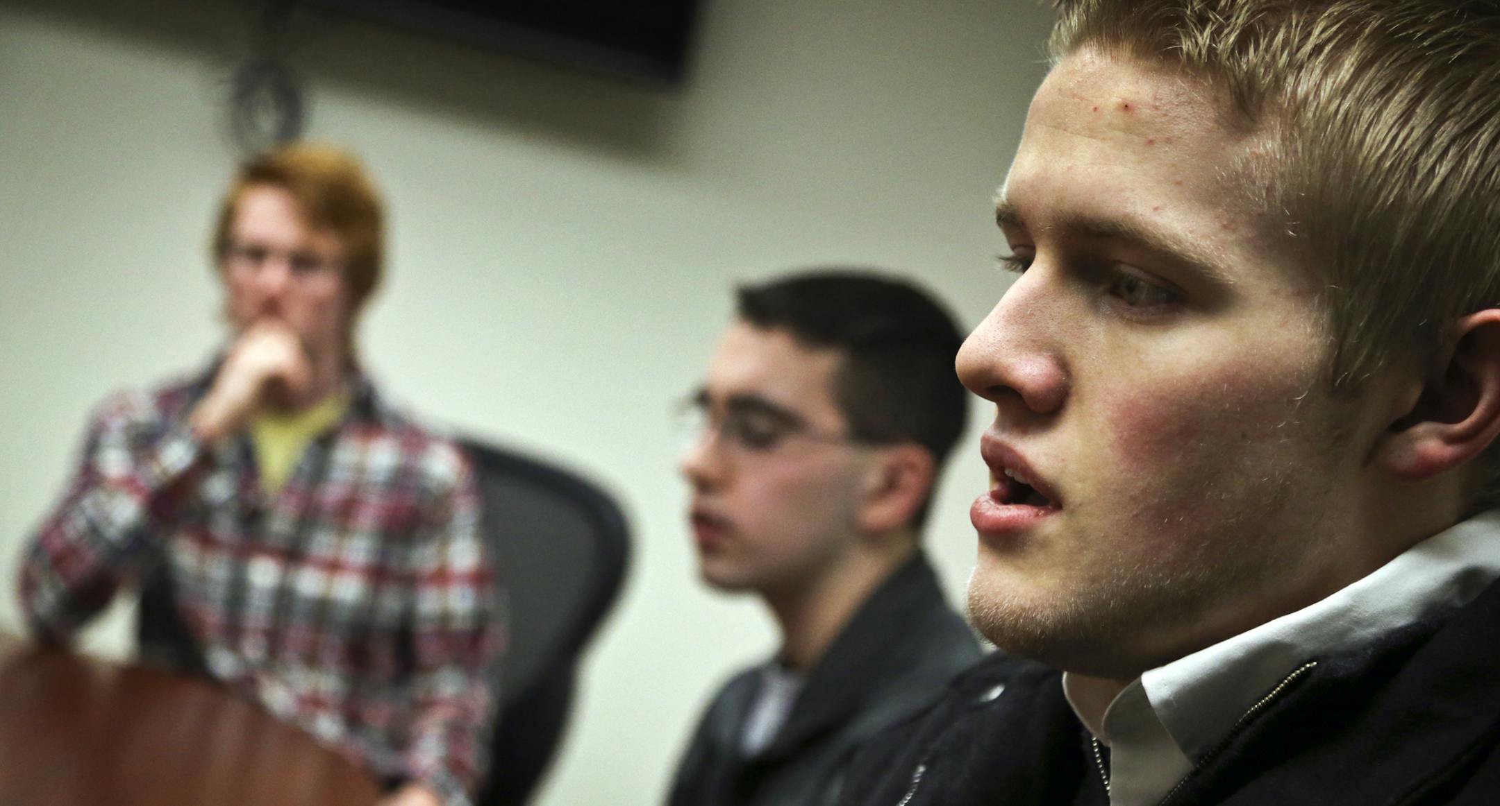 Park High School senior Brandon Trisco, right, talked about the advantages of having a later start to the school day as fellow seniors Eric Brinkoetter, middle, and Nathan Grosse, left, looked on Wednesday, March 18, 2014, in Cottage Grove, MN.](DAVID JOLES/STARTRIBUNE) djoles@startribune.com The South Washington County School District made the move five years ago to push back high school start times in the belief that students who get at least eight hours of sleep are better prepared to learn.
