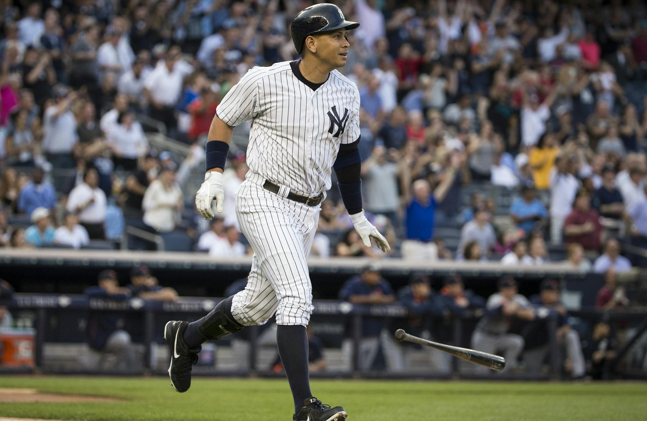 FILE — Alex Rodriguez watches his 3,000th hit, a home run, during a game at Yankee Stadium in New York, June 19, 2015. Zack Hample, the fan who snared that ball and many others in a prolific career in the stands, has reached a deal to present it to Rodriguez in return for tickets, other memorabilia, and a $150,000 donation to charity. (Mark Kauzlarich/The New York Times)