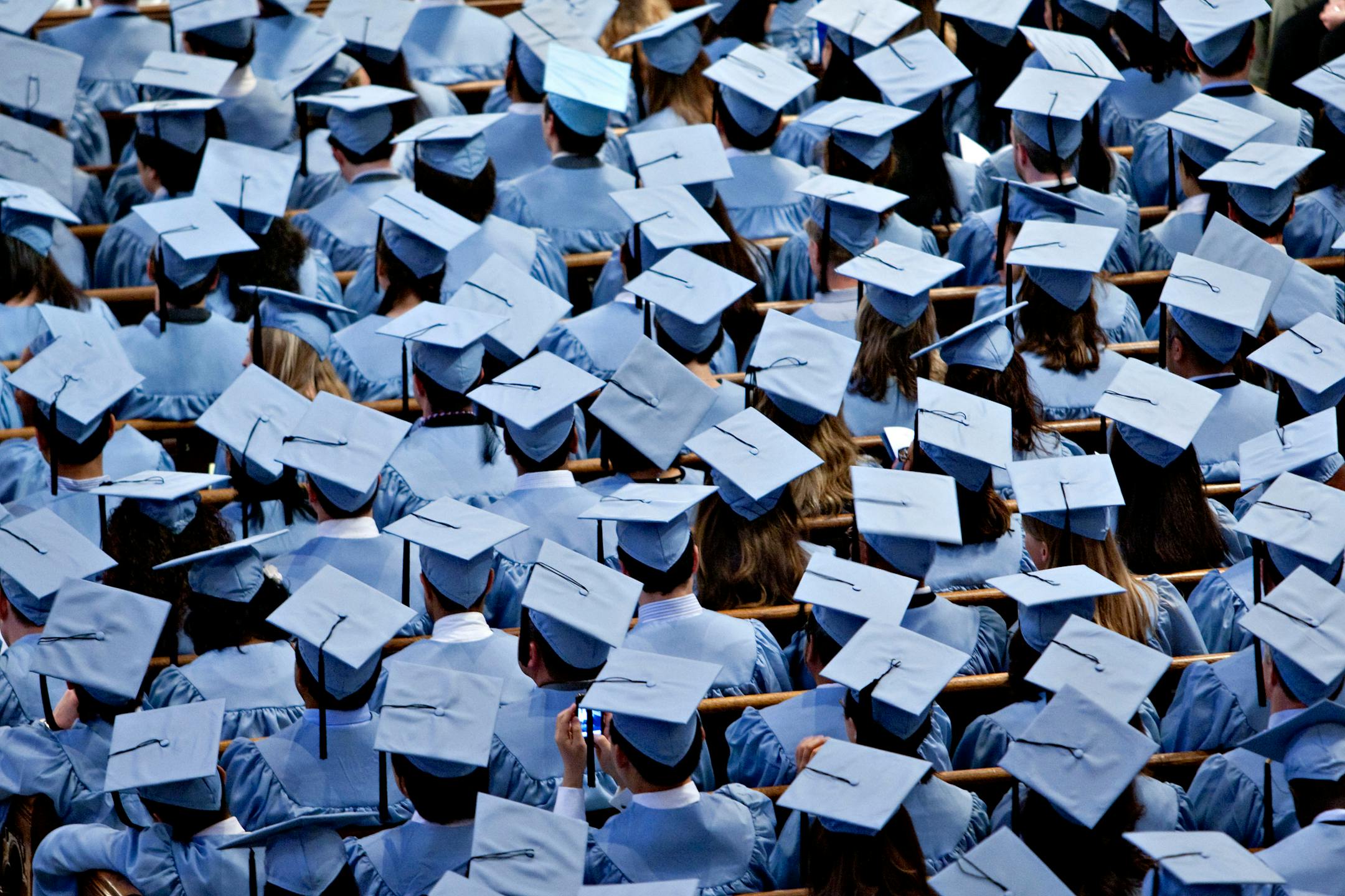 Graduates listen as Vikram Pandit, chief executive officer of Citigroup Inc., speaks during the Columbia University School of International and Public Affairs commencement at Riverside Church in New York, U.S., on Monday, May 17, 2010. Pandit said the U.S. needs "responsible finance" in the wake of the worst economic slowdown since the Great Depression. Photographer: Daniel Acker/Bloomberg