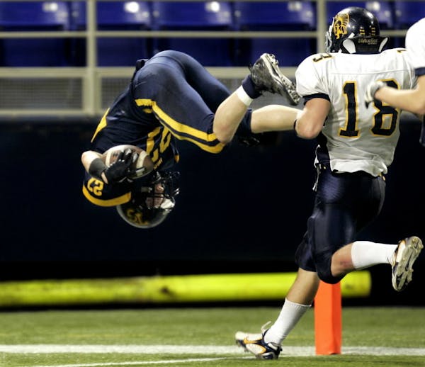 Micah Koehn finished his game-winning touchdown for Totino-Grace with a flip during the 4A title game of the 2007 Prep Bowl.