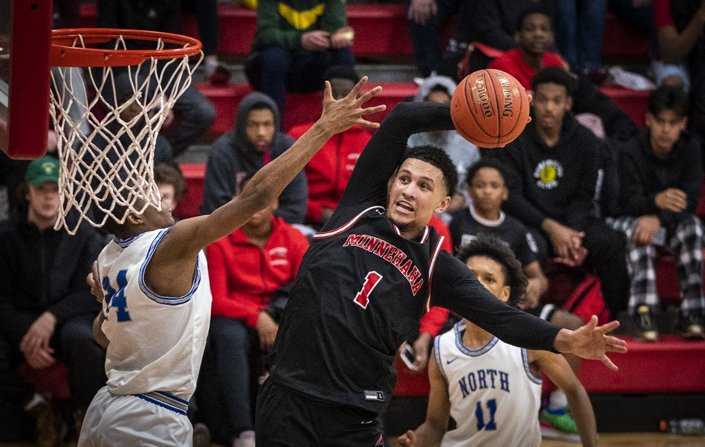 Minnehaha Academy's Jalen Suggs dunked against the defense of Willie Wilson of Minneapolis North. ] LEILA NAVIDI &#x2022; leila.navidi@startribune.com BACKGROUND INFORMATION: Minnehaha Academy boys basketball team played against Minneapolis North at Minnehaha Academy Upper School in Minneapolis on Thursday, February 27, 2020.