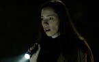 Rebecca Hall appears in a scene from the film "The Night House." (Searchlight Pictures via AP)