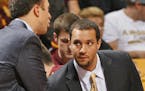 Former Minnesota assistant Ben Johnson listened to head coach Richard Pitino during a 2017 home game. Johnson is at Xavier now.