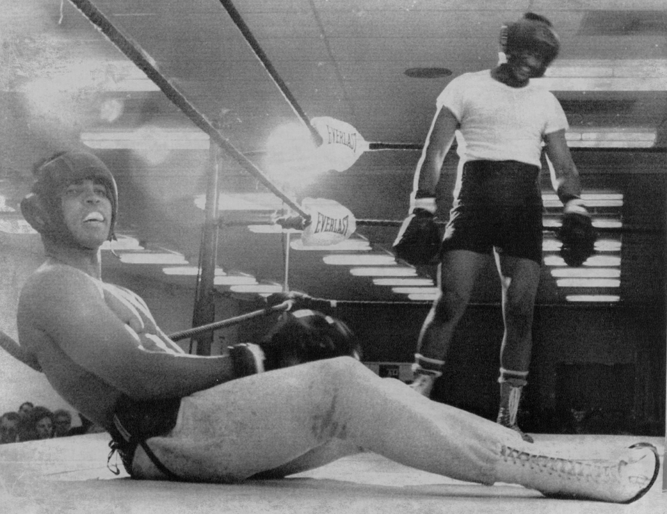 July 15, 1971 Ali takes a sparring stretch Muhammad Ali, training in Houston for a fight July 26 with Jimmy Ellis, stretched between sparring rounds Wednesday. A new opponent (background) was getting. July 14, 1971 Associated Press