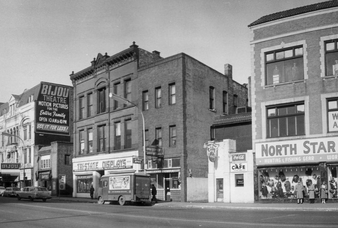 MINNEAPOLIS IN 1960 / Minneapolis Loop -- Washington Avenue between Hennepin Ave. and First Ave. North -- note Bijou Theatre, and the North Star Army and Navy Goods at 228 Washington / 1960 Minneapolis Survey Drawer / photo February 1960 by Minneapolis Star and Tribune staff photographer Roy Swan.