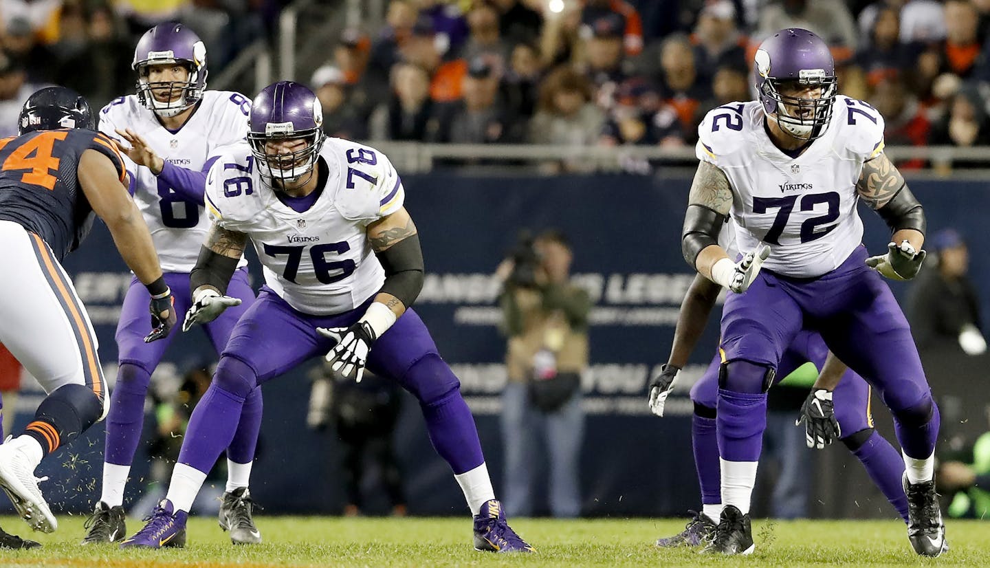 Minnesota Vikings offensive lineman Alex Boone (76) and Jake Long (72) protected quarterback Sam Bradford.