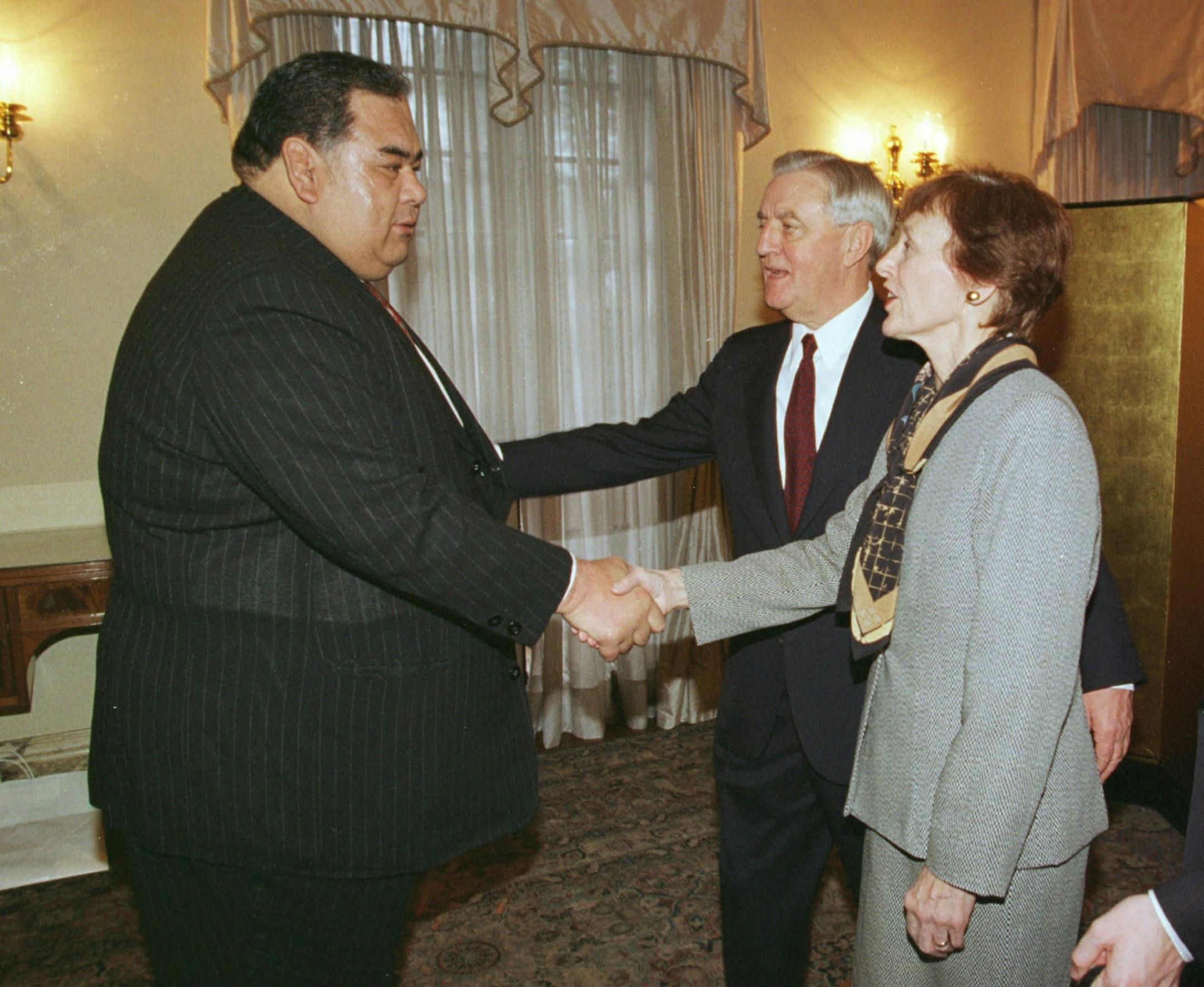 SPECIAL FOR STAR TRIBUNE, MINNEAPOLIS, ST. PAUL, MN.,--Former sumo wrestling star Oyakata Azumazeki shakes hands with Walter and Joan Mondale at the US embassy in Tokyo.
