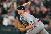 Minnesota Twins relief pitcher Louie Varland throws against the Chicago White Sox during the sixth inning of a baseball game Friday, Sept. 15, 2023, i
