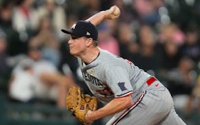 Minnesota Twins relief pitcher Louie Varland throws against the Chicago White Sox during the sixth inning of a baseball game Friday, Sept. 15, 2023, i