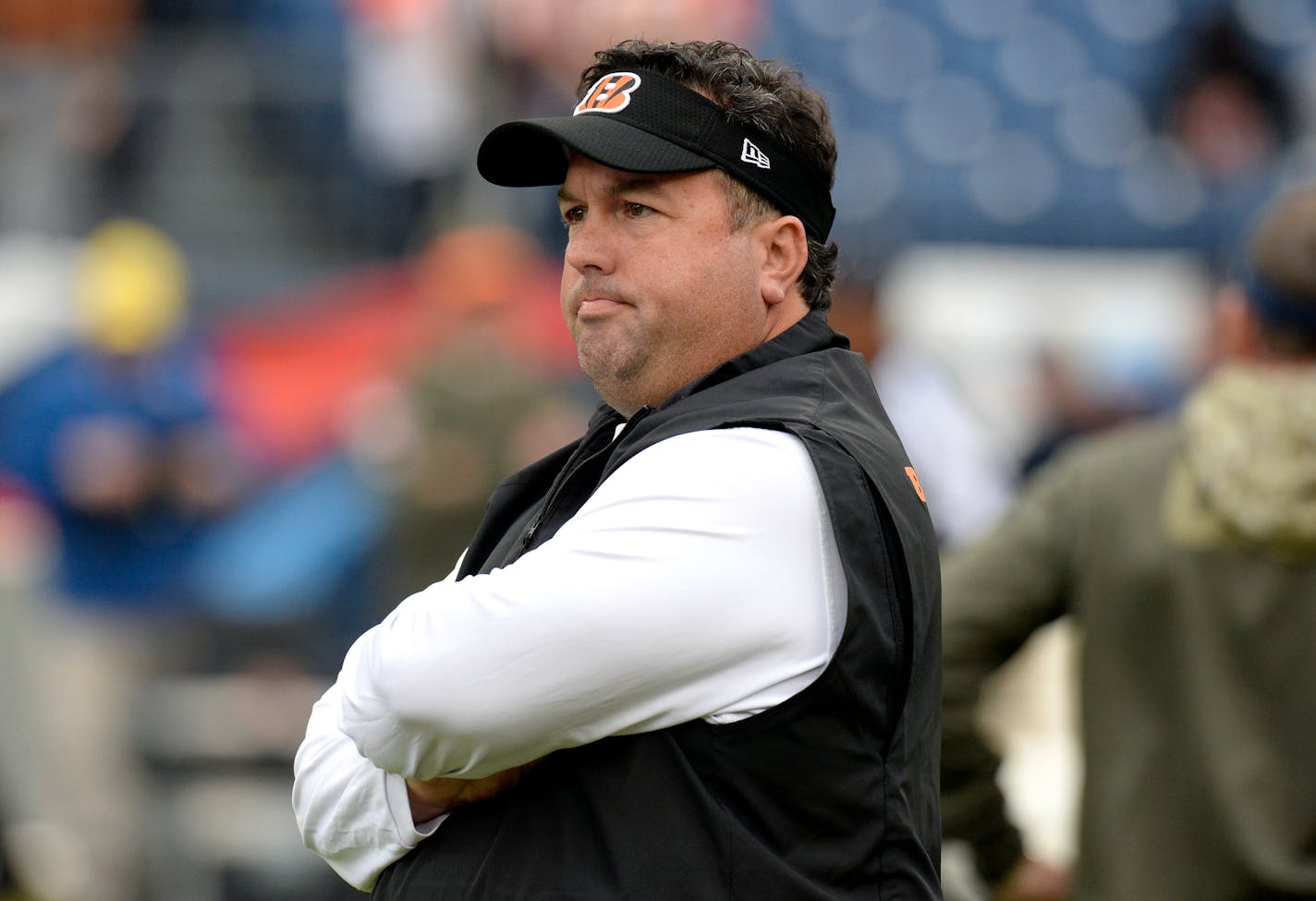 Cincinnati Bengals defensive coordinator Paul Guenther watches players warm up before an NFL football game between the Bengals and the Tennessee Titans Sunday, Nov. 12, 2017, in Nashville, Tenn. (AP Photo/Mark Zaleski)