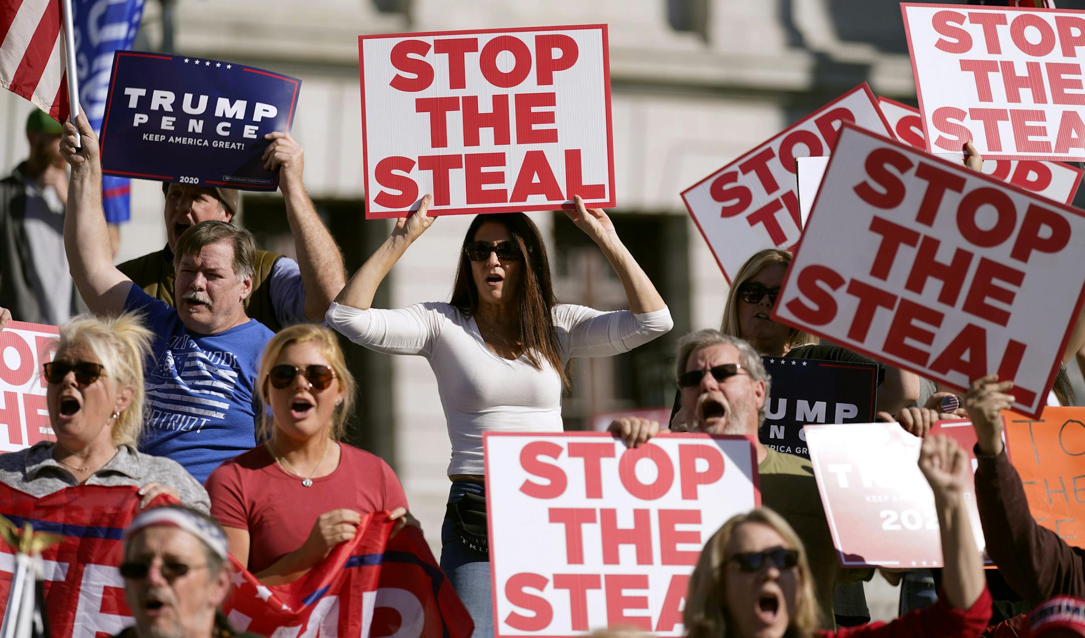 People demonstrate outside the Pennsylvania State Capitol on Nov. 6 in Harrisburg, Pa., as vote counting continued.