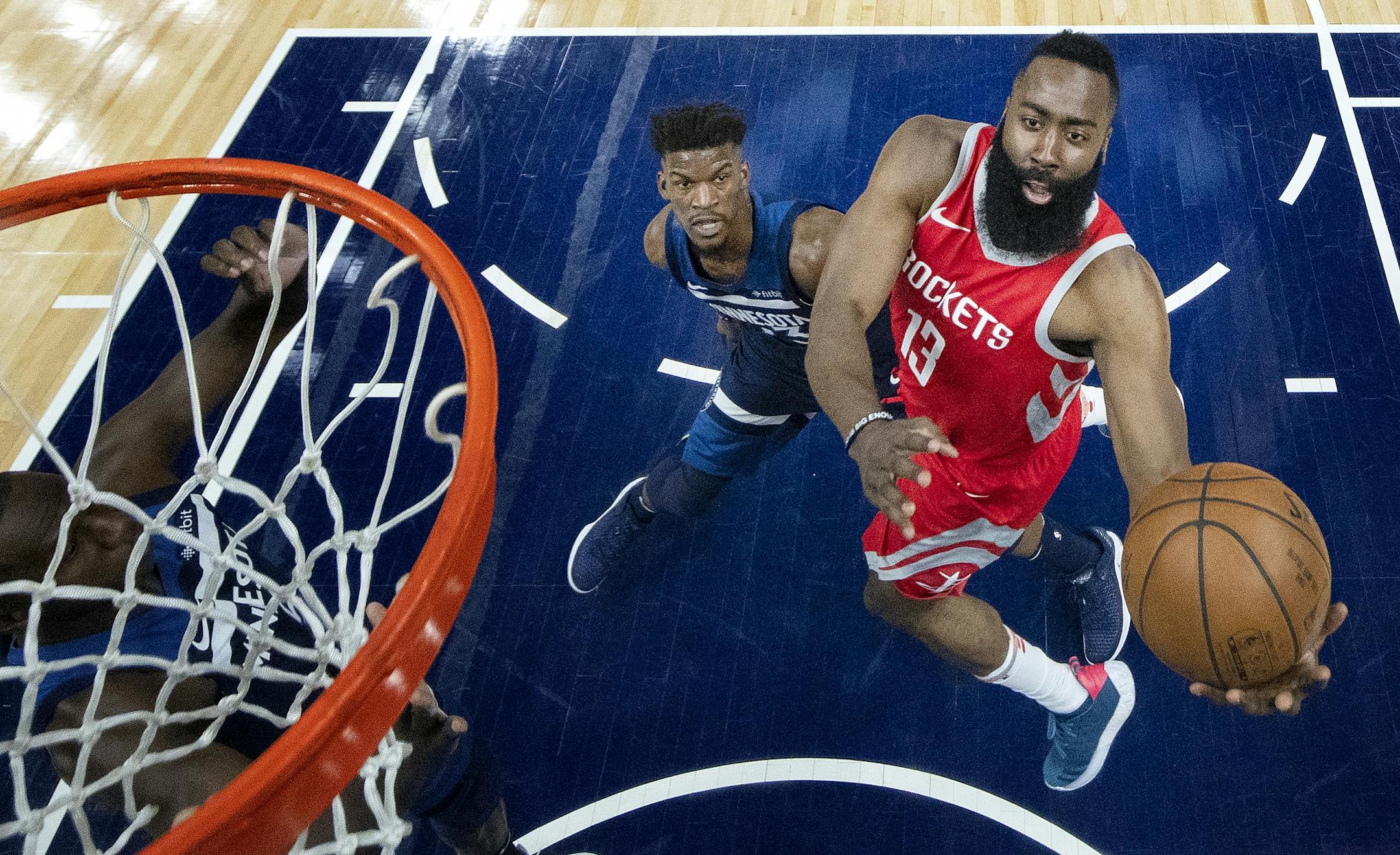 James Harden (13) was defended by Jimmy Butler (23) in the first half.