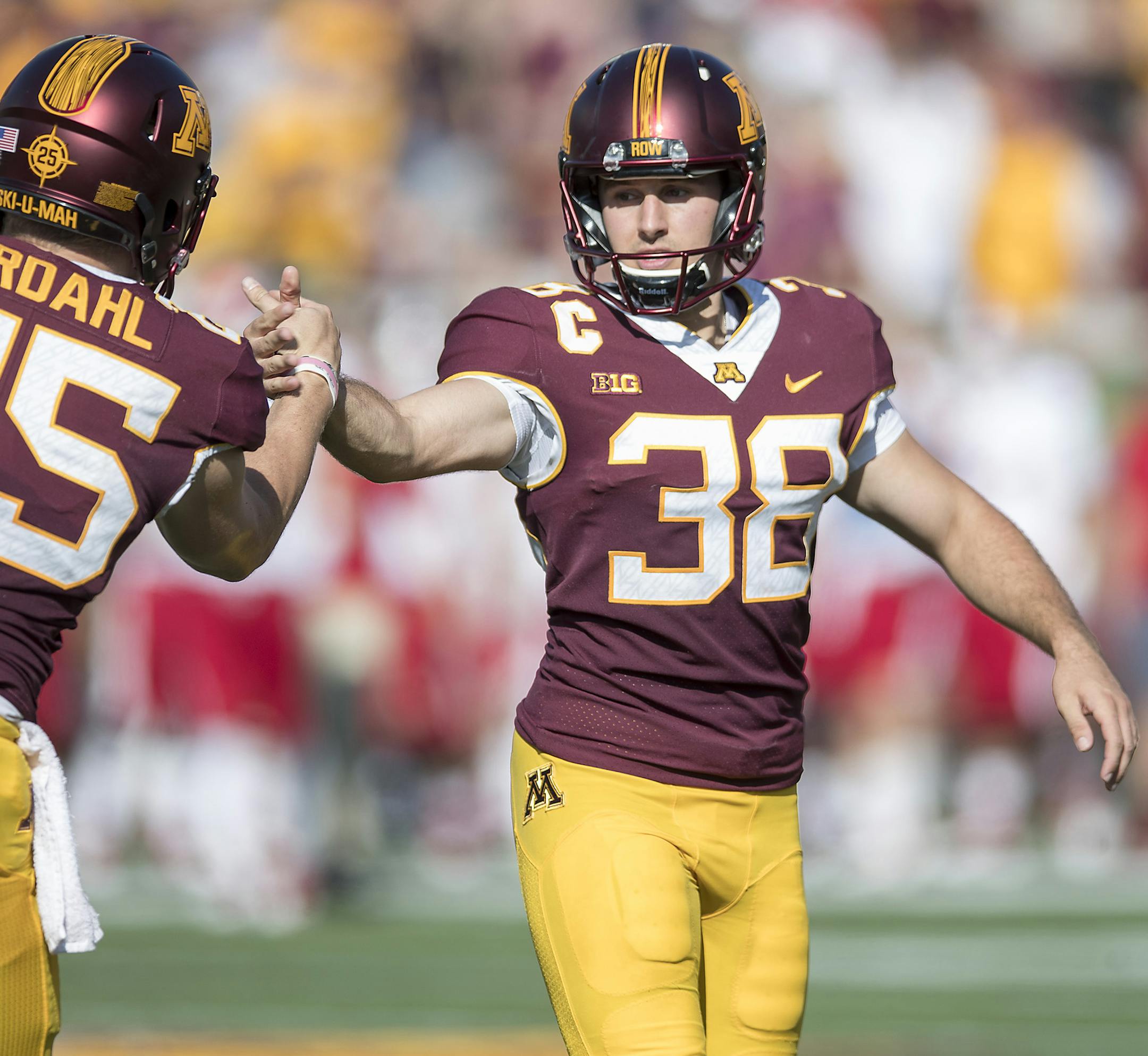Minnesota's place kicker Emmit Carpenter celebrated after a field goal with teammate Payton Jordahl during the second quarter as Minnesota took on Miami (Ohio), Saturday, September 15, 2018 in Minneapolis, MN. ] ELIZABETH FLORES &#xef; liz.flores@startribune.com