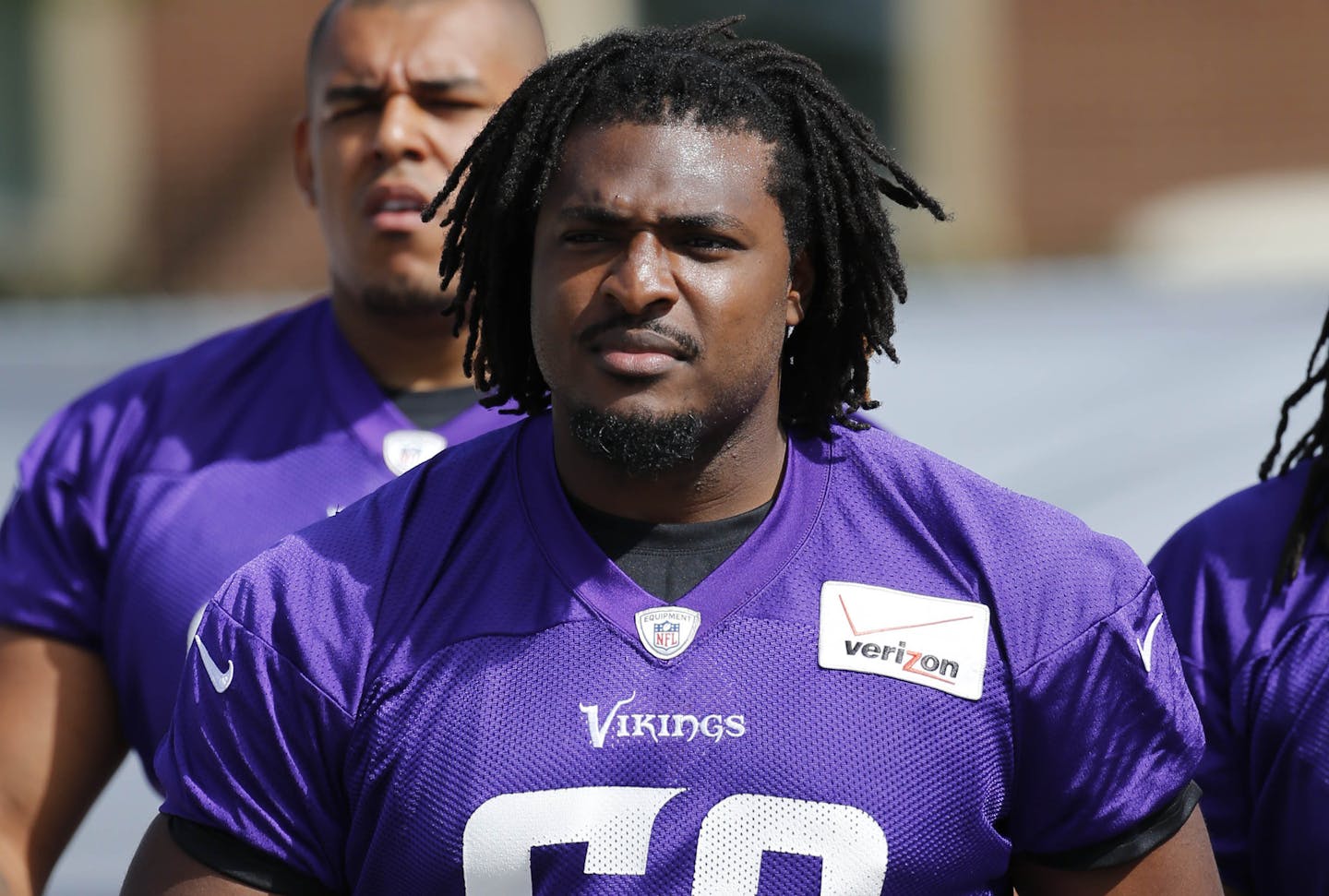 Minnesota Vikings offensive tackle T.J. Clemmings walks to the practice fields at an NFL football training camp on the campus of Minnesota State University Sunday, July 26, 2015, in Mankato, Minn. (AP Photo/Charles Rex Arbogast)