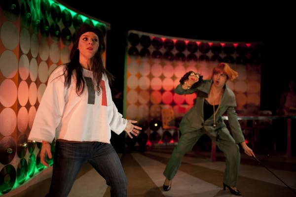 Jamie Elvey, left, stars as Hanan, a Lebanese singer who surrenders her identity for Latin pop stardom, in "Learn to Be Latina." Aditi Kapil plays an 