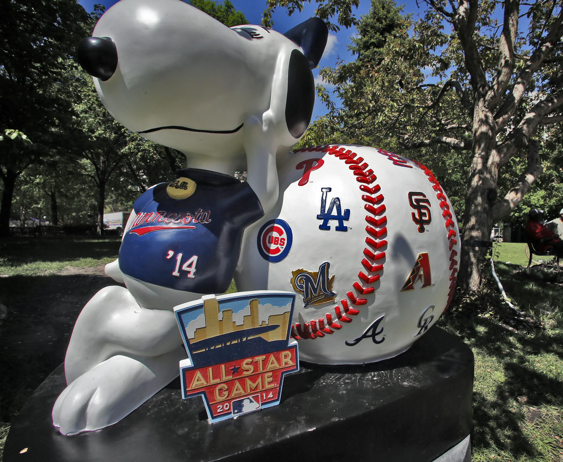 Character Belle with baseball. ] Peanuts comic strip characters on display in Rice Park in downtown St. Paul. (MARLIN LEVISON/STARTRIBUNE(mlevison@startribune.com) ORG XMIT: MIN1405281648172084