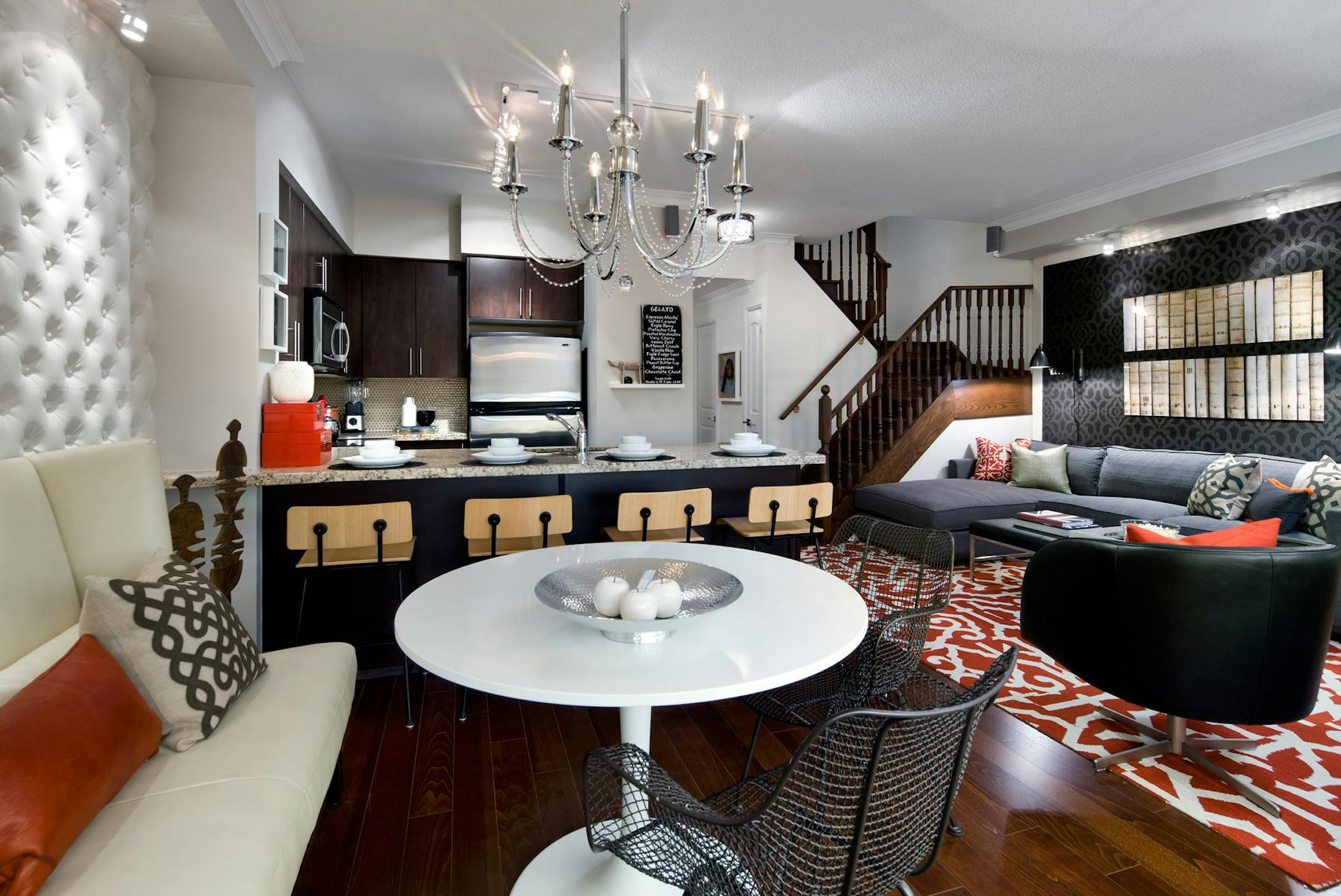 The main floor of this penthouse is a compact space, with an L-shaped living and dining room framing the kitchen. The dining area was transformed into an ultra-hip lounge, perfect for entertaining. (Brandon Barre/MCT) ORG XMIT: 1147805