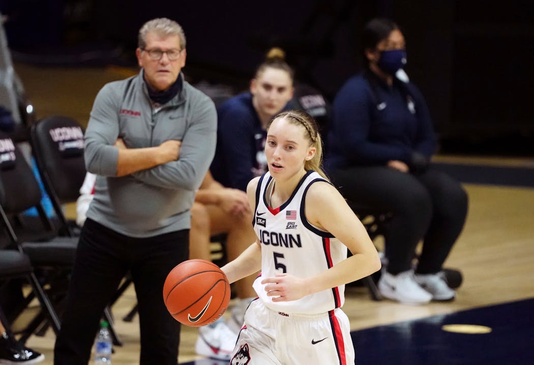 The next part of Paige Bueckers' basketball career is being monitored under the watchful eye of UConn coach Geno Auriemma.