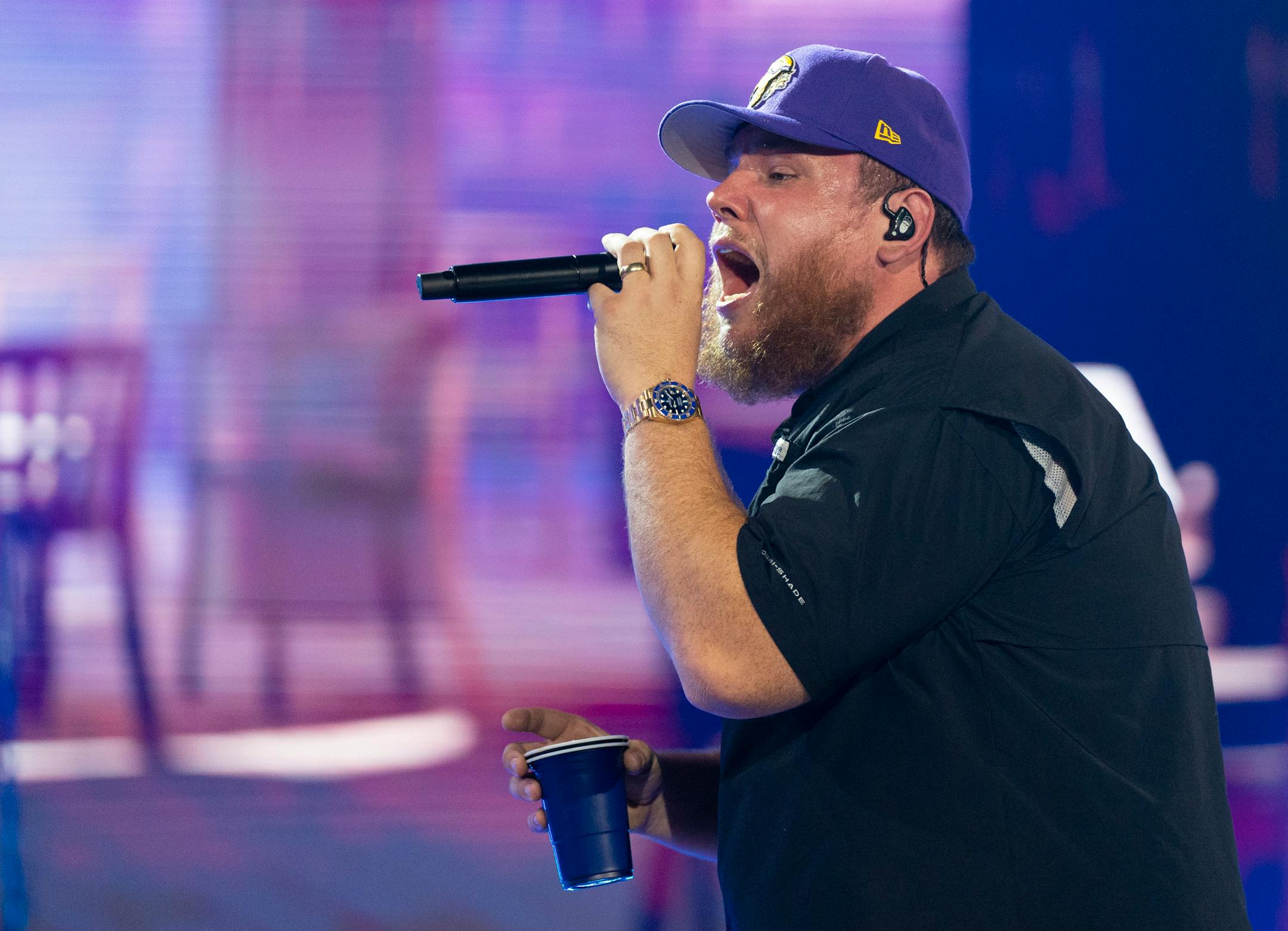 Luke Combs performs at U.S. Bank Stadium.