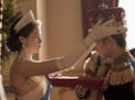 Queen Elizabeth II (Claire Foy) formally makes Philip (Matt Smith) a British Prince in "The Crown." Robert Viglasky / Netflix
