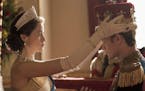 Queen Elizabeth II (Claire Foy) formally makes Philip (Matt Smith) a British Prince in "The Crown." Robert Viglasky / Netflix
