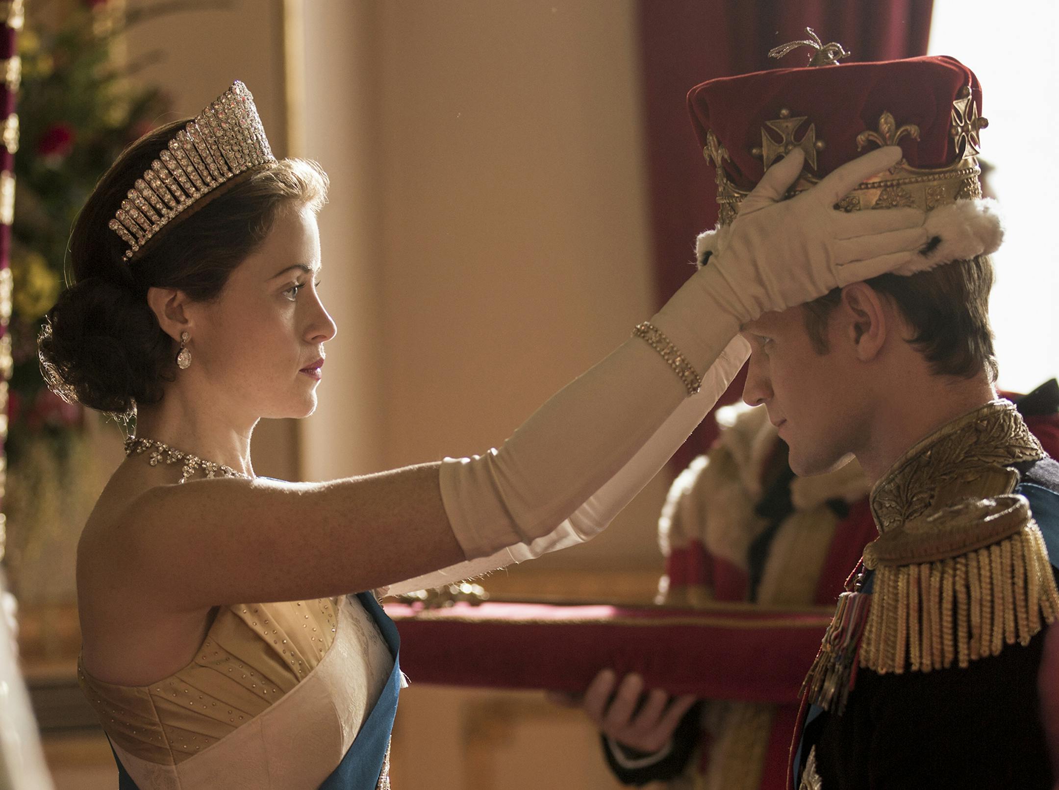 Queen Elizabeth II (Claire Foy) formally makes Philip (Matt Smith) a British Prince in "The Crown." Robert Viglasky / Netflix