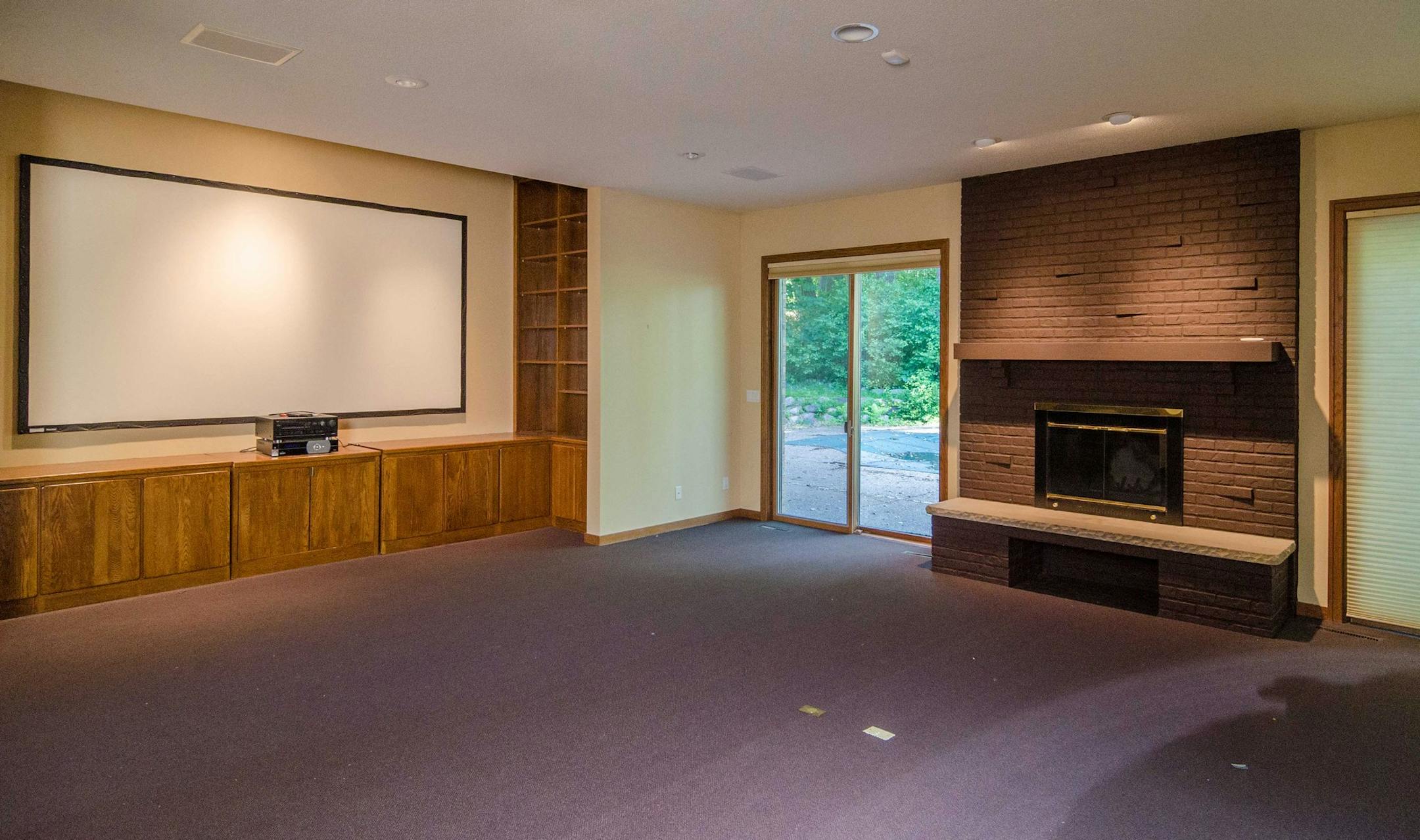Provided photo Before the makeover, lower-level family room