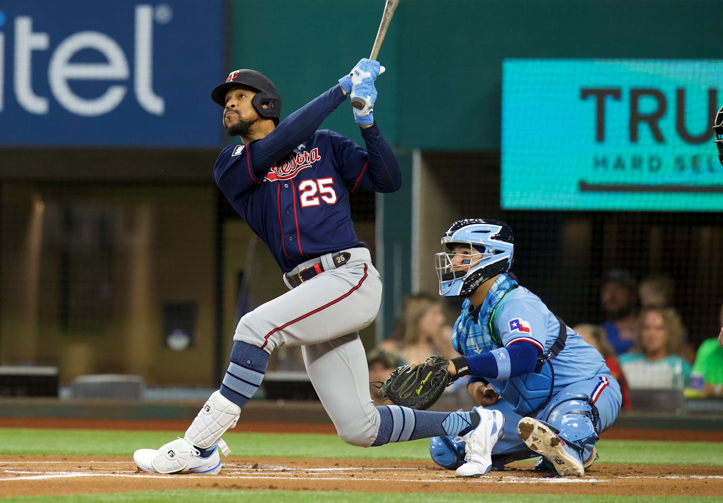 Minnesota Twins Byron Buxton (25) hits a home run in the first inning against the Texas Rangers at a baseball game Sunday, June 20, 2021, in Arlington, Texas. (AP Photo/Richard W. Rodriguez)