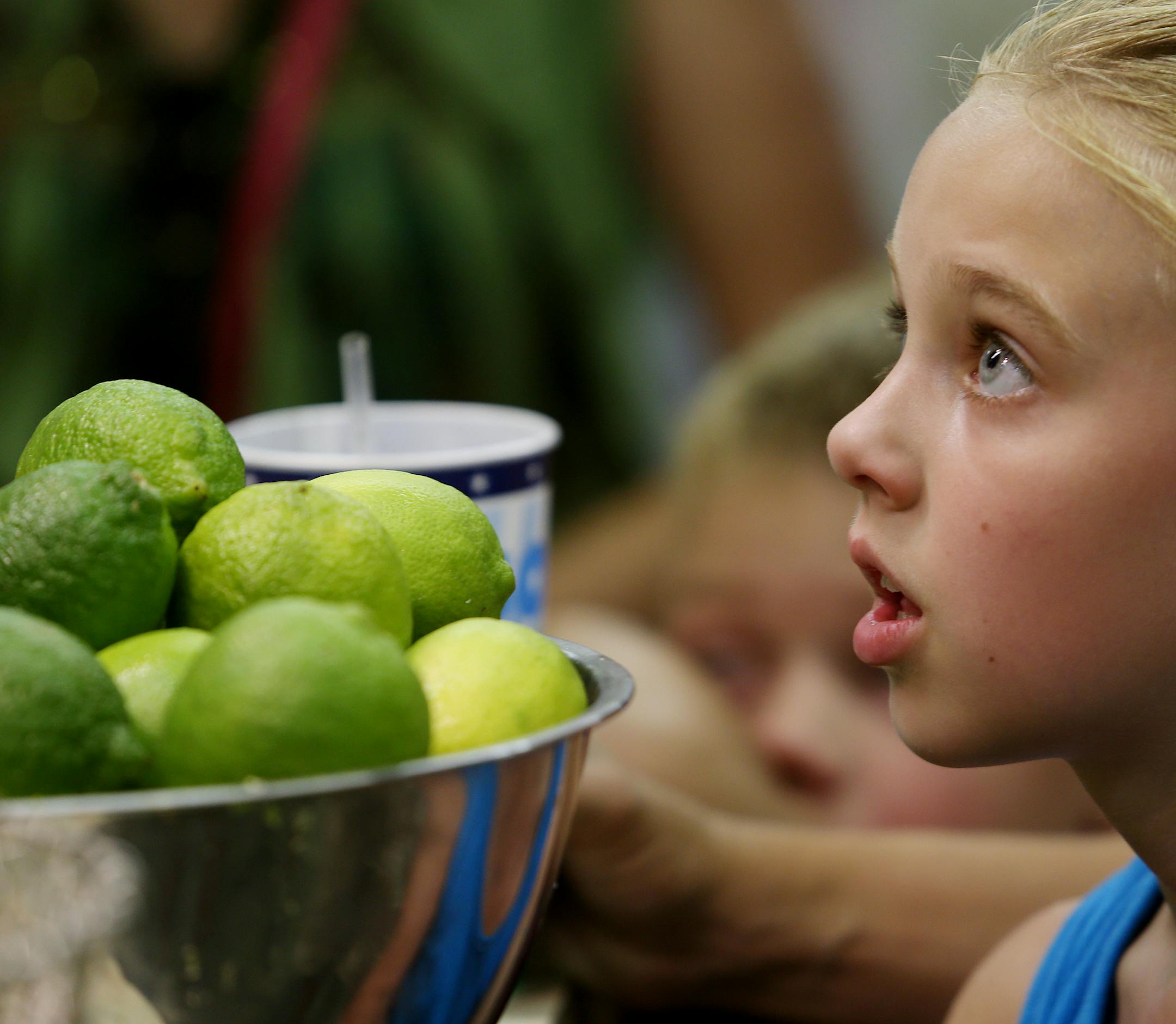 Billy Newcomb had Abby Vanderwerf (9 years old) from Willmar meserized seconds after he started his pitch selling his salsa maker at the Minnesota State Fair.